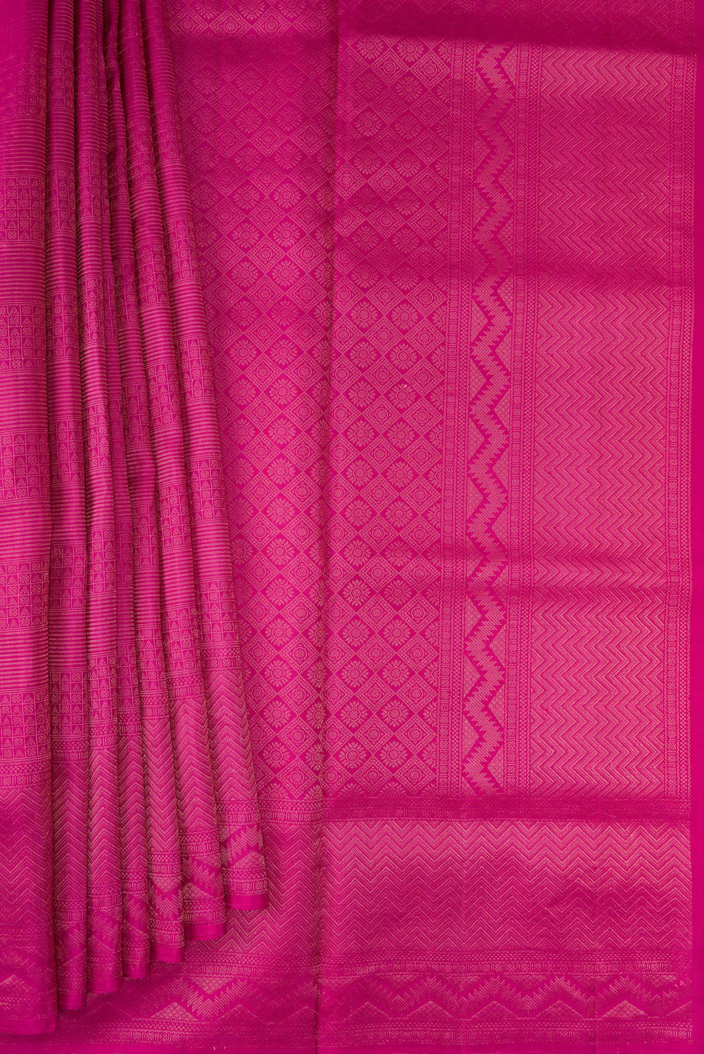 Pleats and pallu of Magenta Soft Silk Saree with Zari Brocade on the body and Fancy Border. 