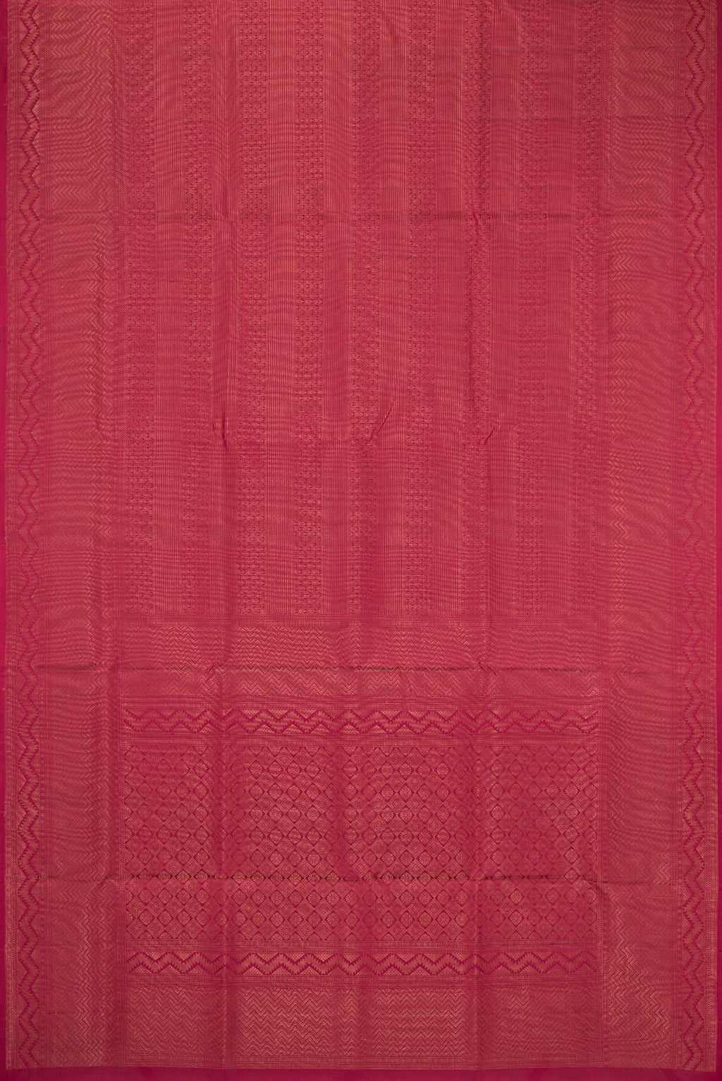 Flat view of Maroon Soft Silk Saree with Zari Brocade on the body and Fancy Border. 