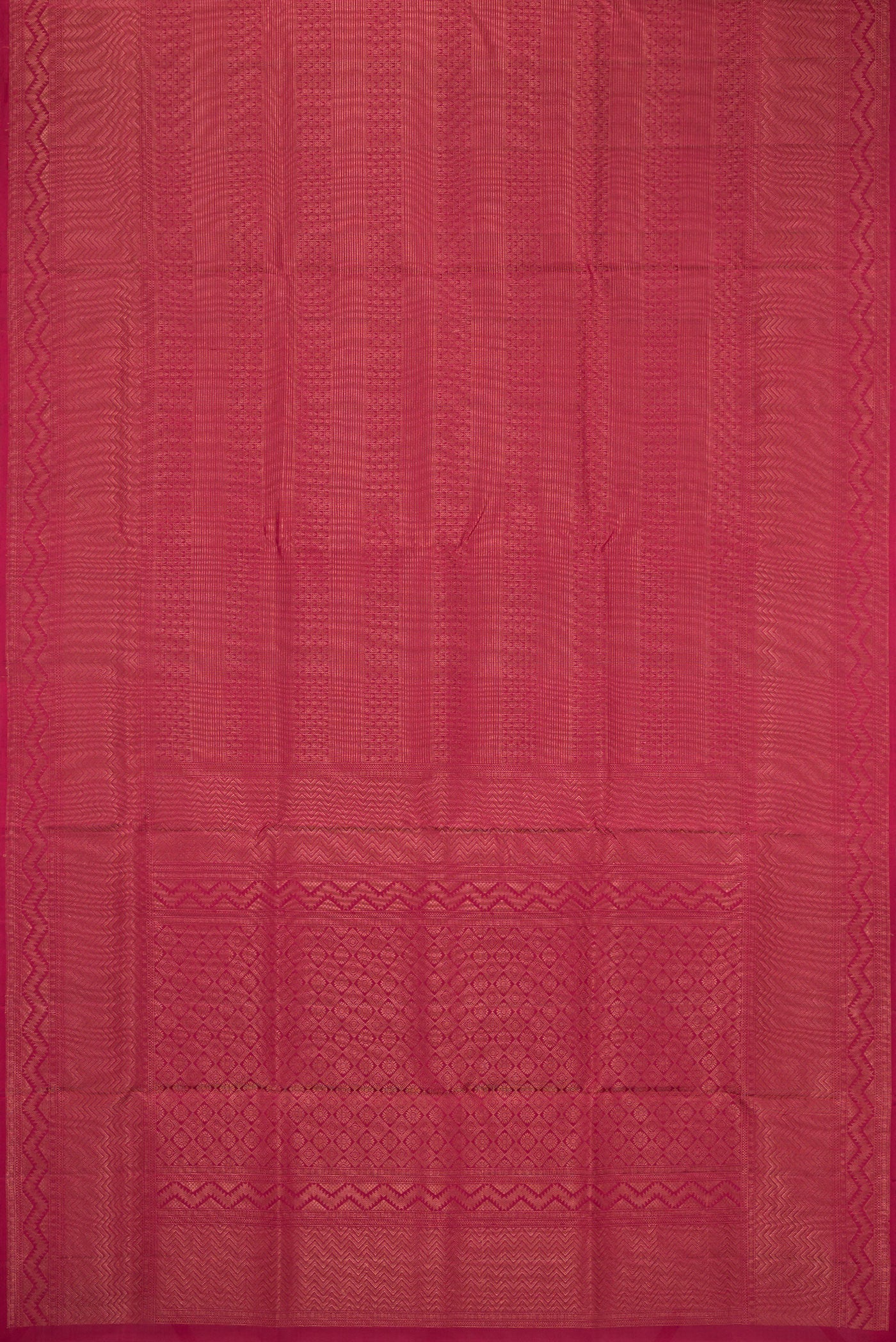 Flat view of Maroon Soft Silk Saree with Zari Brocade on the body and Fancy Border. 