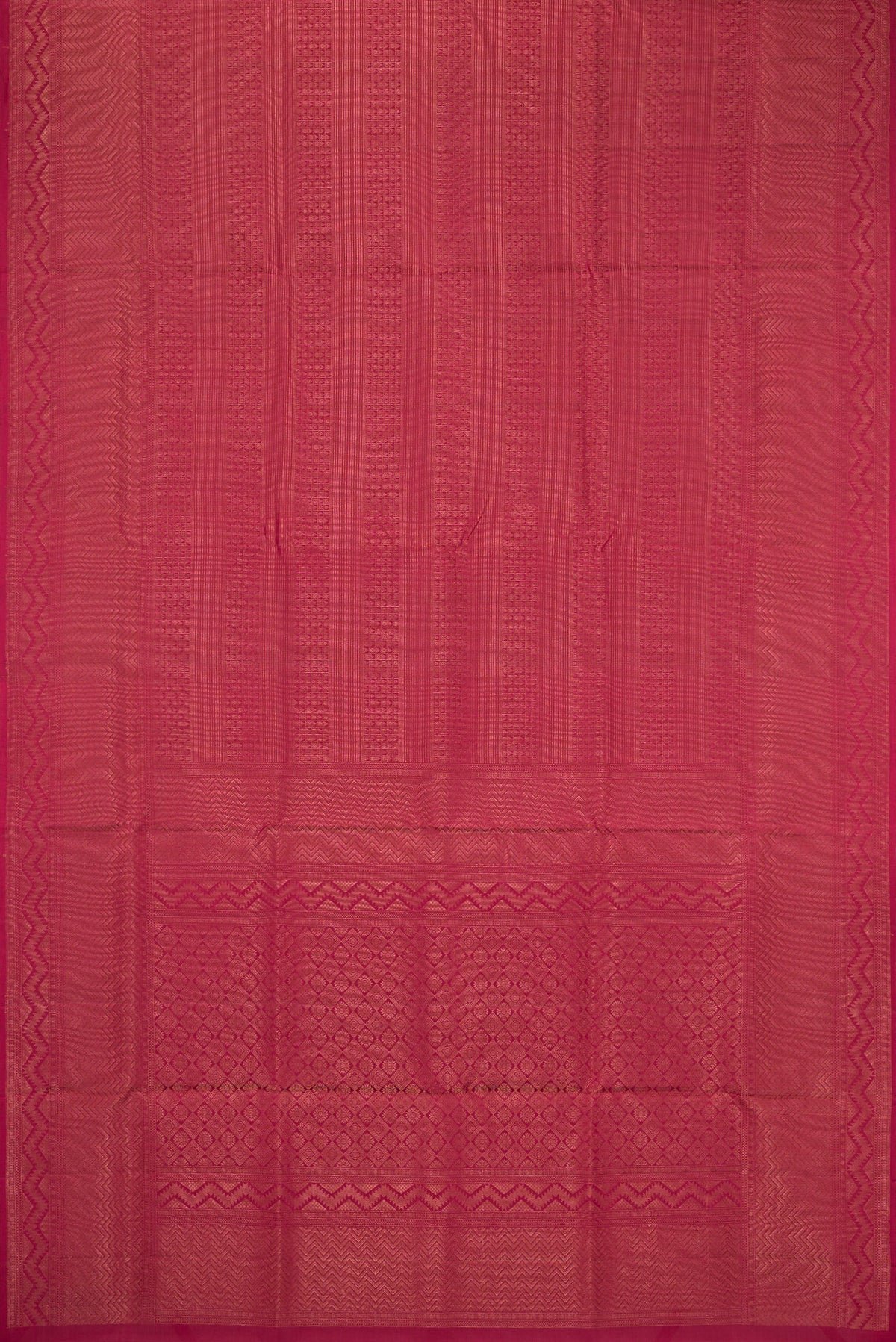 Flat view of Maroon Soft Silk Saree with Zari Brocade on the body and Fancy Border. 