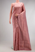 Rose Gold Soft Silk Saree with Zari Brocade on the body and Fancy Border.  displayed on a mannequin