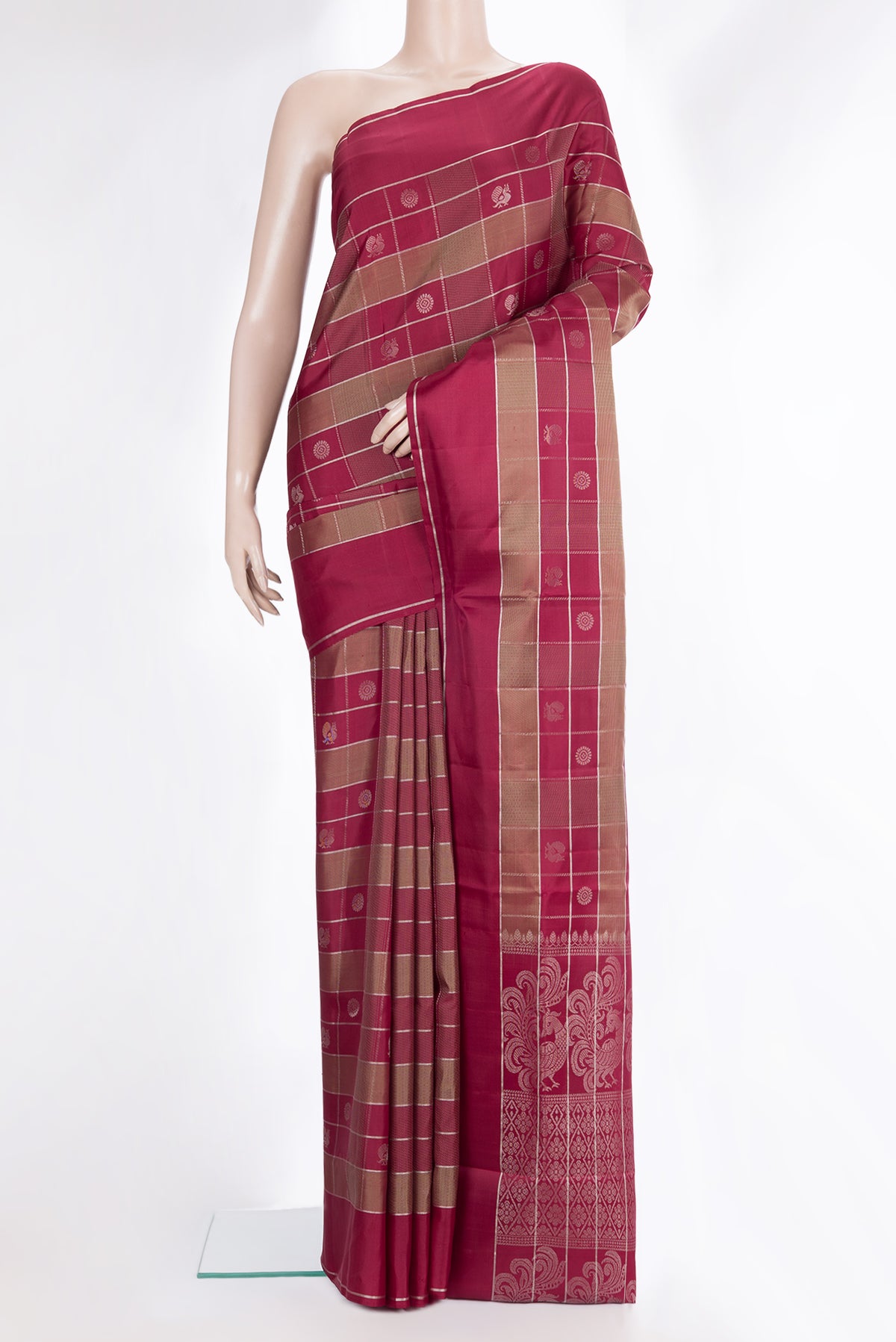 Pure Silk Maroon Dual Tone Soft Saree with Checked design on the body and Zari Border.  displayed on a mannequin