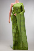 Green Soft Silk Saree with Checked design on the body and Plain Border.  displayed on a mannequin