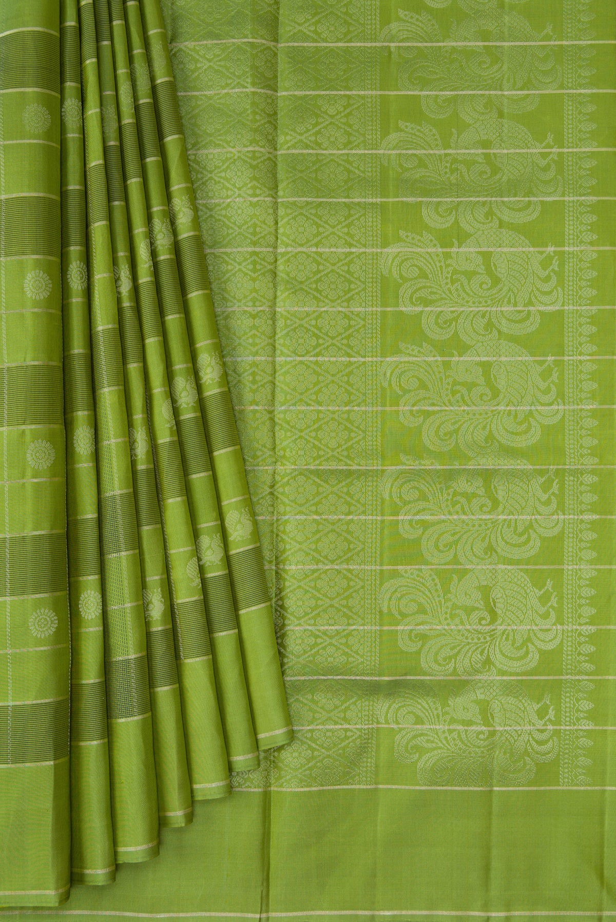 Pleats and pallu of Green Soft Silk Saree with Checked design on the body and Plain Border. 
