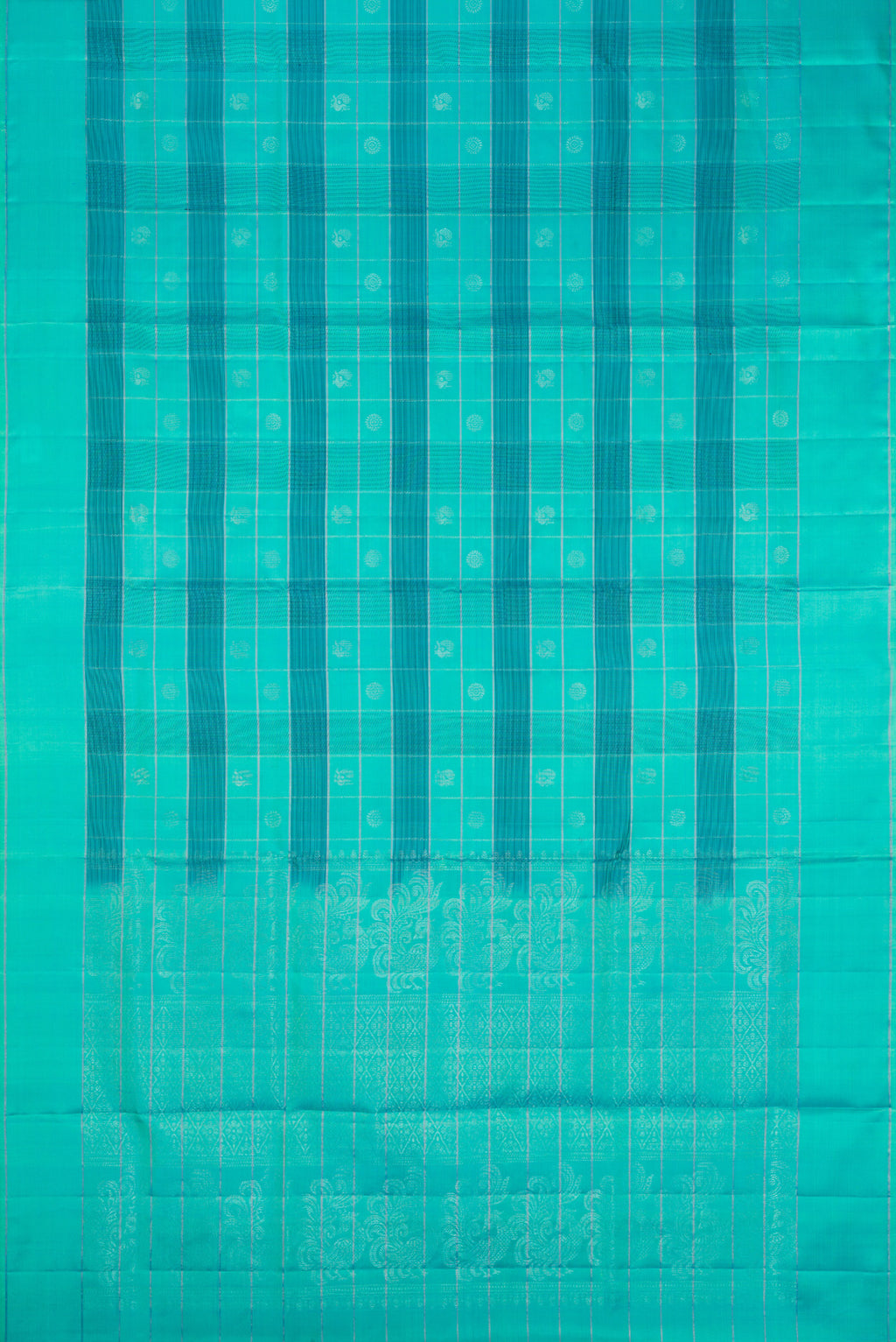Flat view of Sea Green Soft Silk Saree with Checked design on the body and Plain Border. 