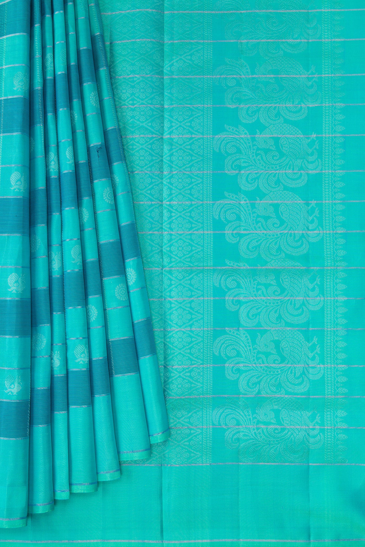 Pleats and pallu of Sea Green Soft Silk Saree with Checked design on the body and Plain Border. 