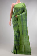 Green Soft Silk Saree with Checked design on the body and Plain Border.  displayed on a mannequin