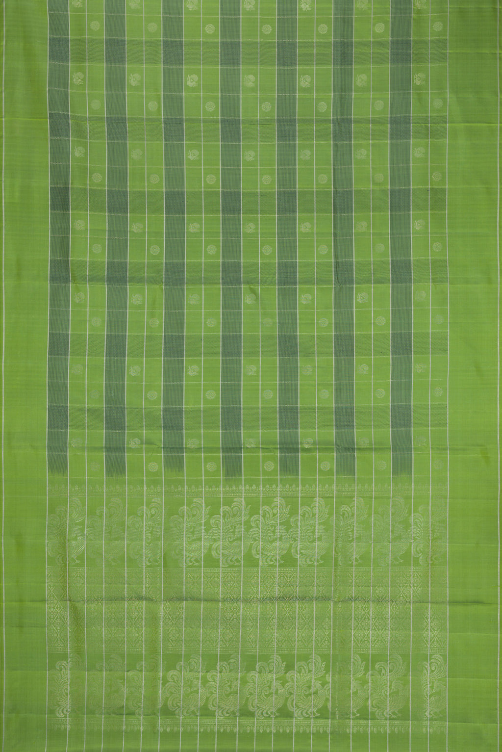 Flat view of Green Soft Silk Saree with Checked design on the body and Plain Border. 