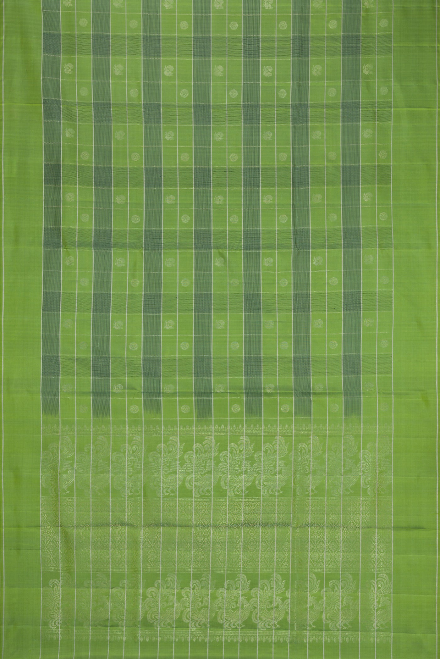Flat view of Green Soft Silk Saree with Checked design on the body and Plain Border. 