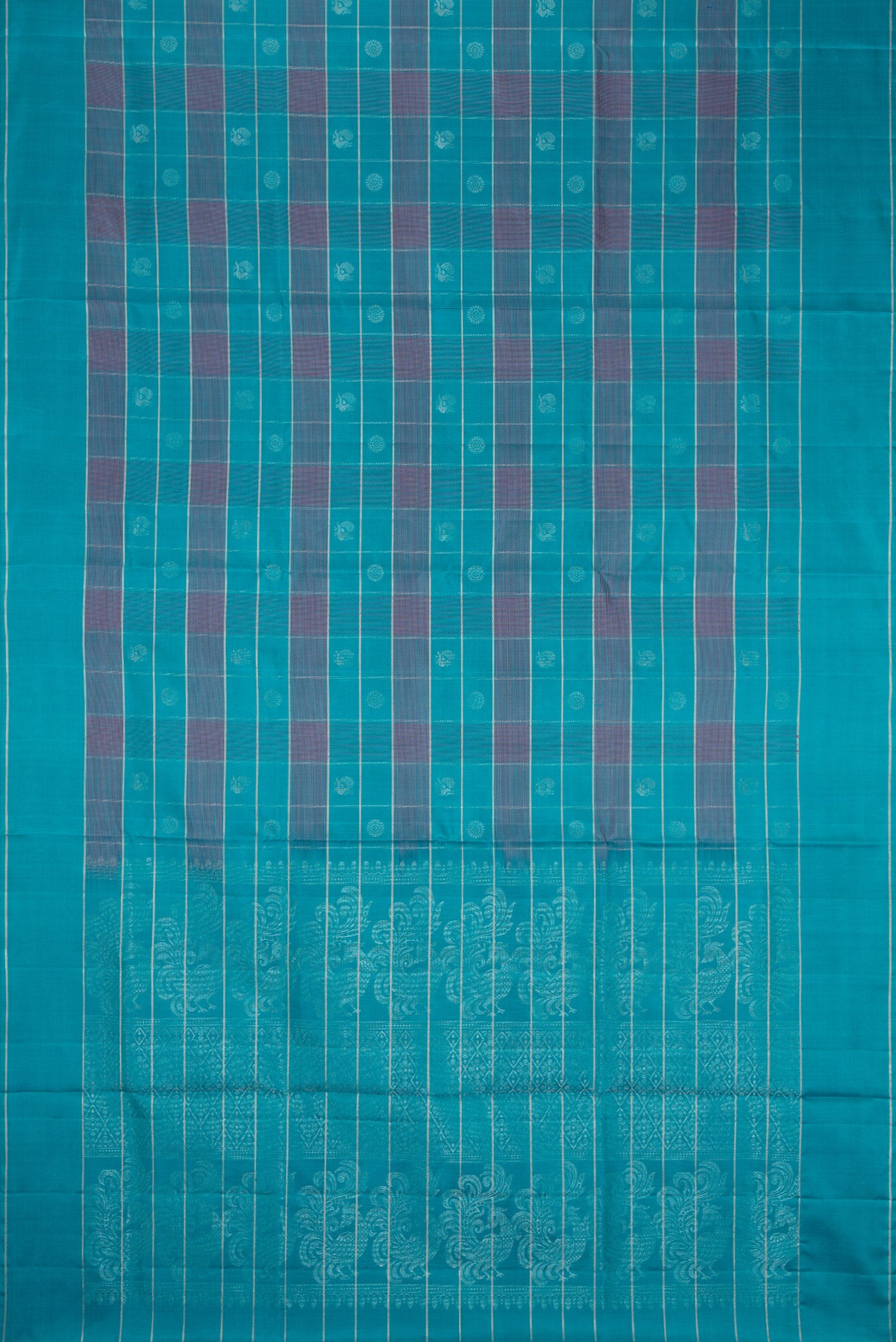 Flat view of Sky Blue Soft Silk Saree with Checked design on the body and Plain Border. 