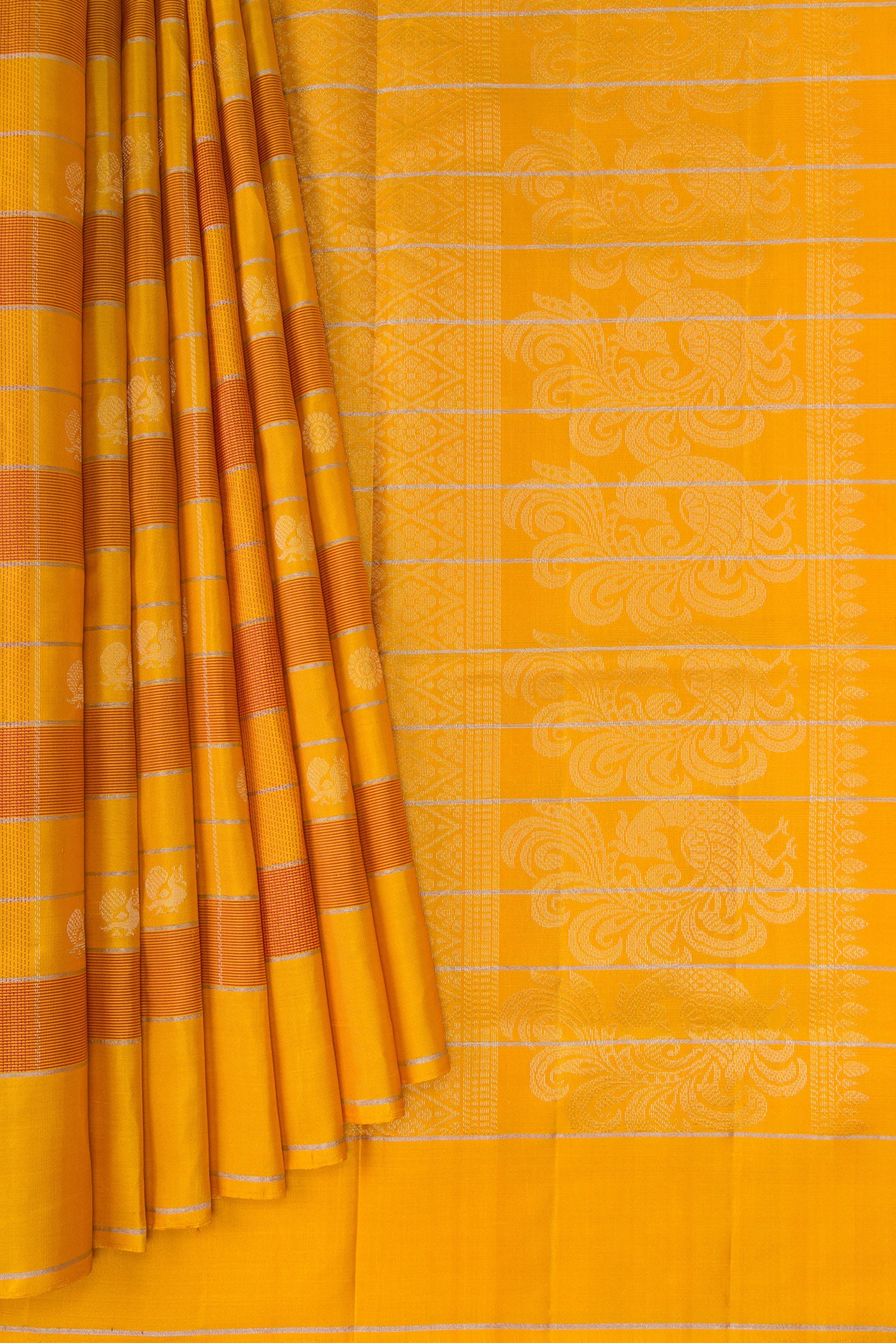 Pleats and pallu of Mustard Soft Silk Saree with Checked design on the body and Plain Border. 