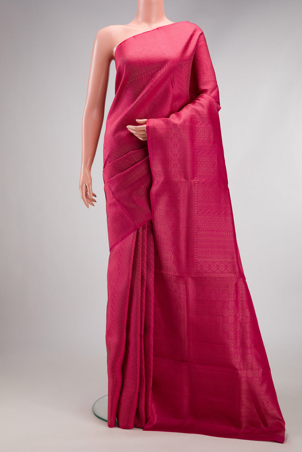 Pink Soft Silk Saree with Zari Brocade on the body and Fancy Border.  displayed on a mannequin