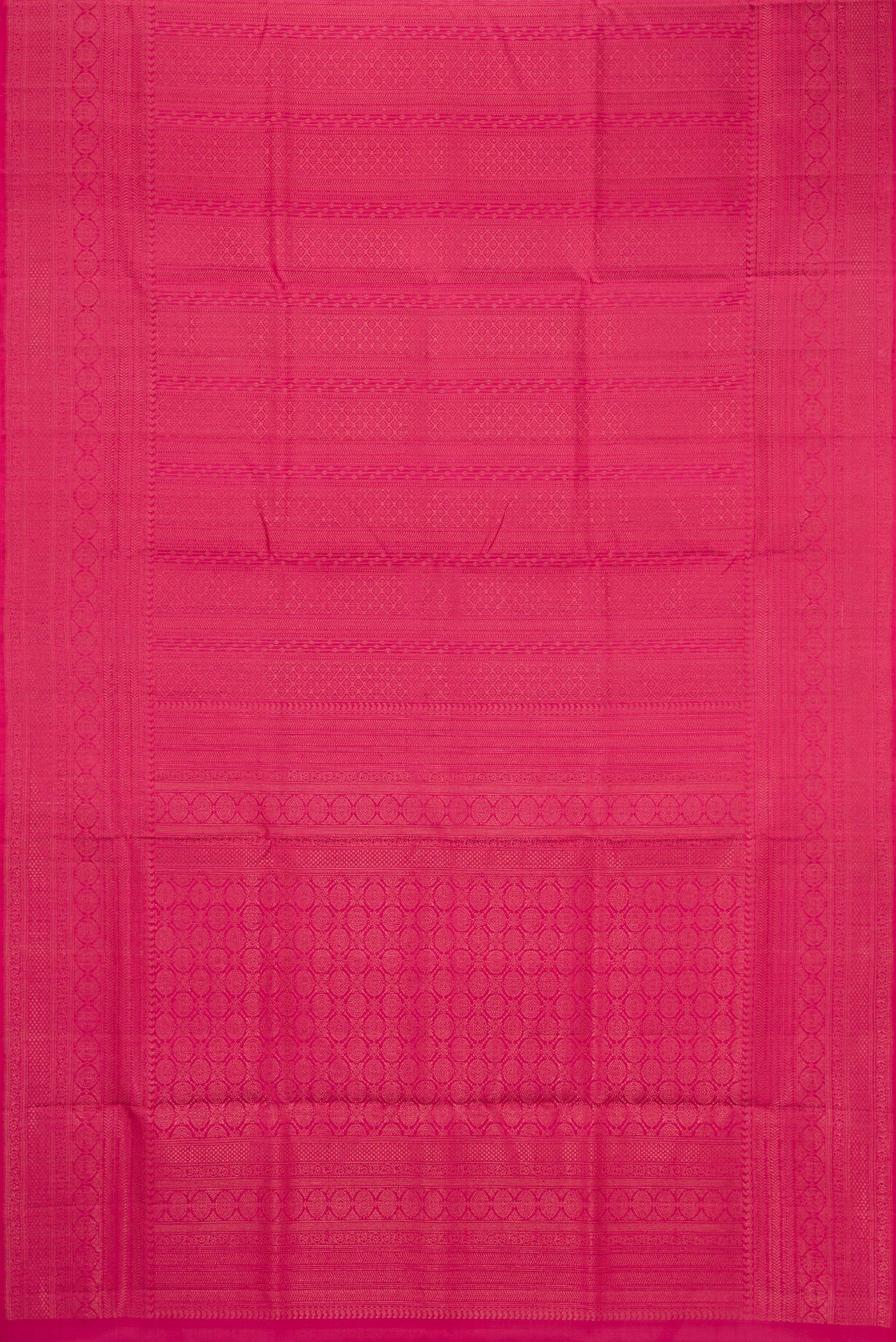 Flat view of Pink Soft Silk Saree with Zari Brocade on the body and Fancy Border. 