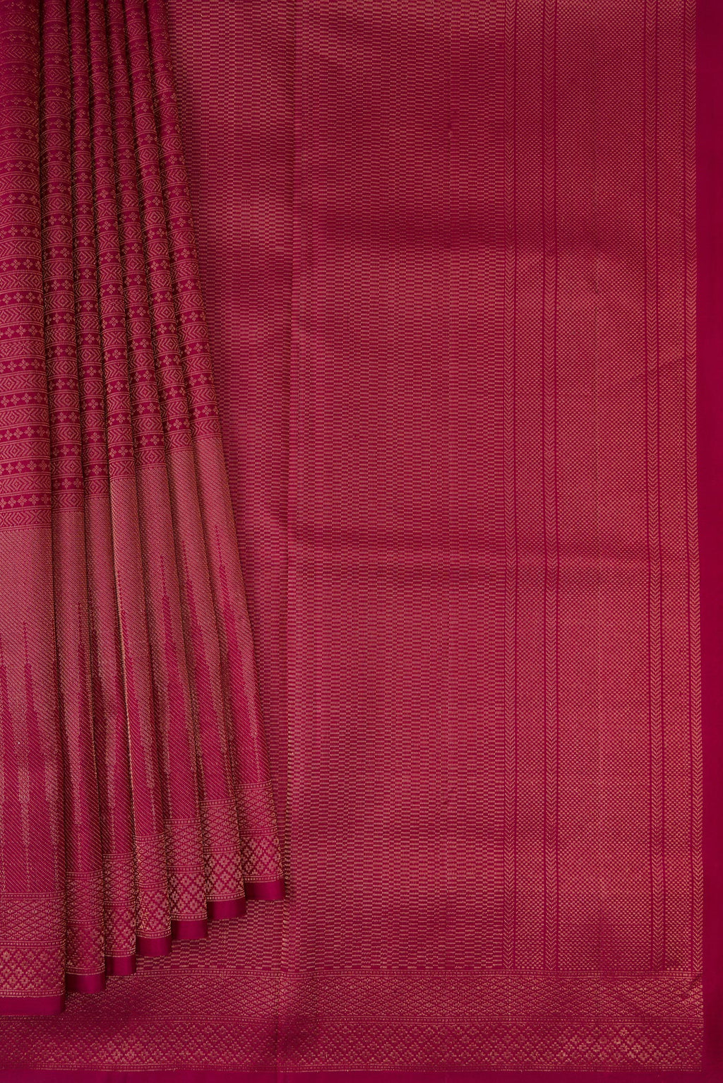 Pleats and pallu of Maroon Soft Silk Saree with Zari Brocade on the body and Fancy Border. 