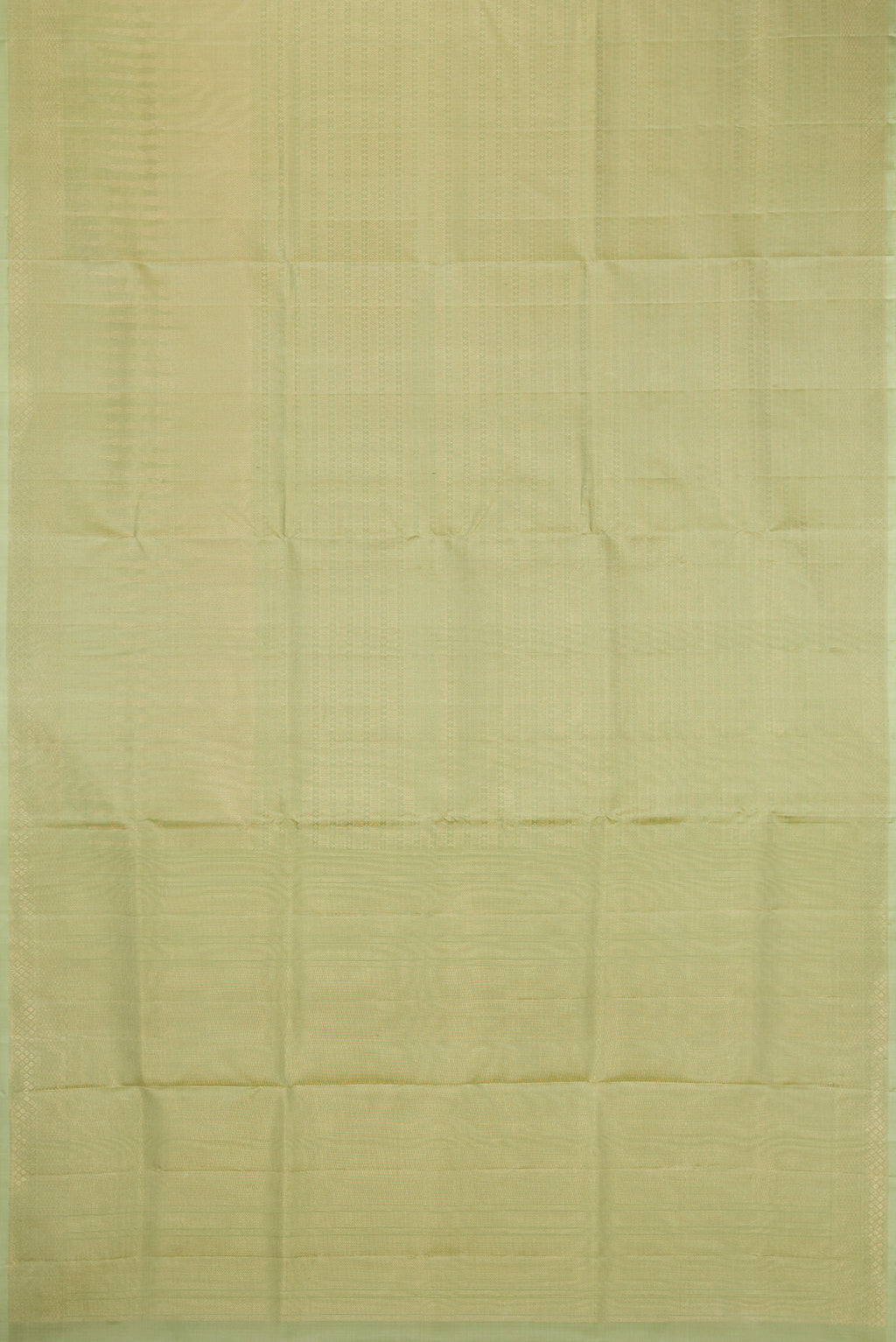 Flat view of Pista Green Soft Silk Saree with Zari Brocade on the body and Fancy Border. 