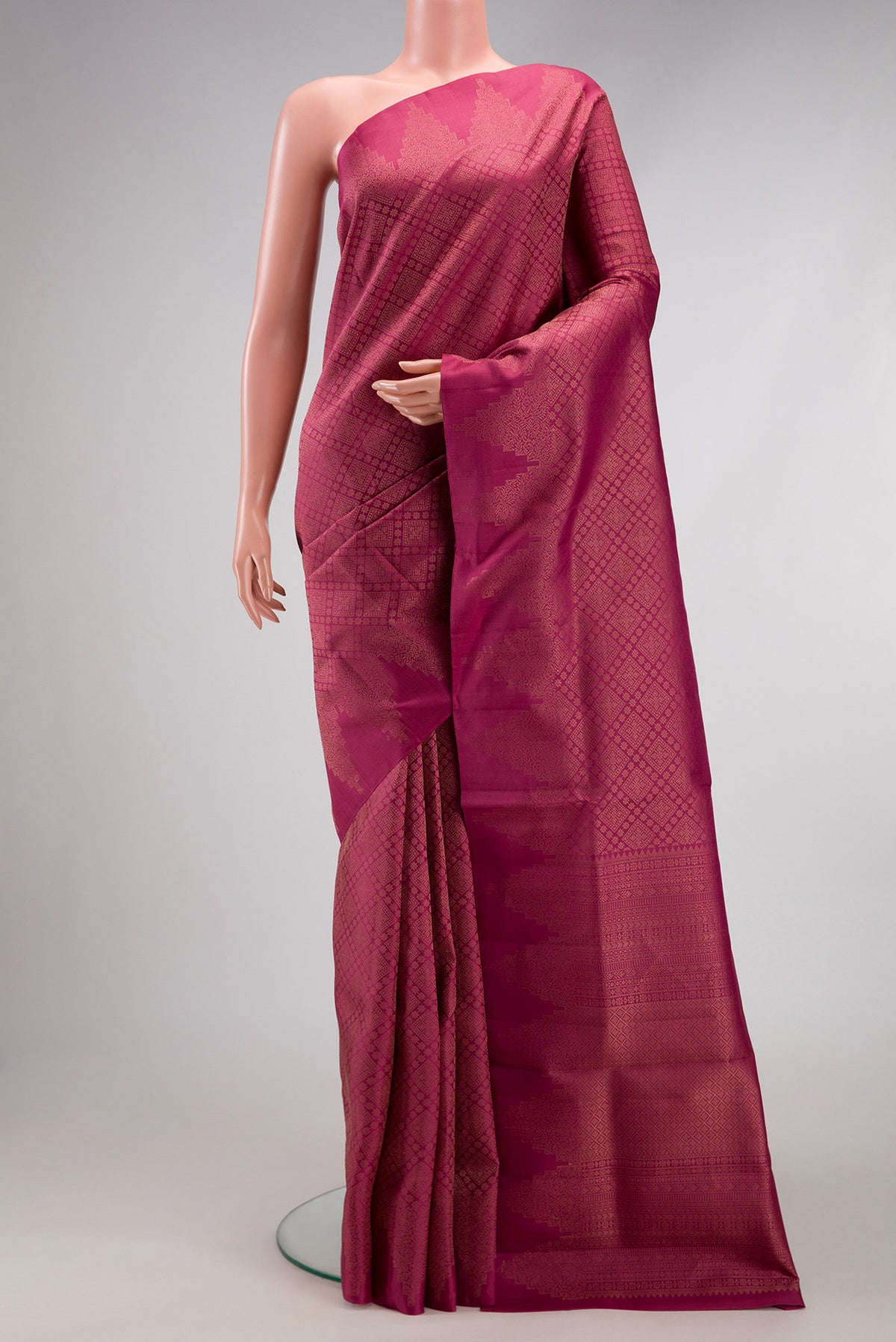 Pink Soft Silk Saree with Zari Brocade on the body and Fancy Border.  displayed on a mannequin