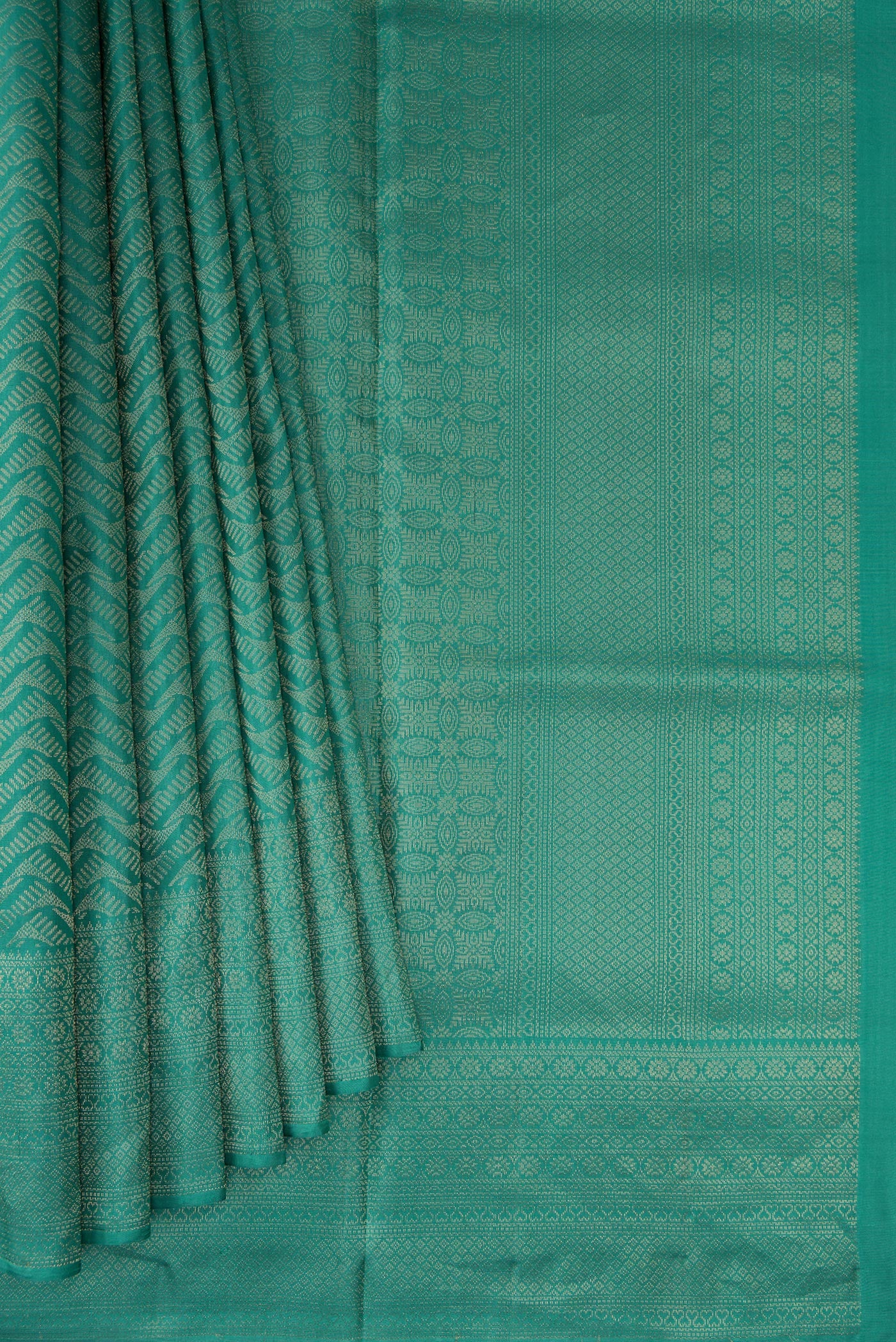 Pleats and pallu of Maya Blue Soft Silk Saree with Zari Brocade on the body and Fancy Border. 