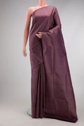 Purple Soft Silk Saree with Zari Brocade on the body and Fancy Border.  displayed on a mannequin