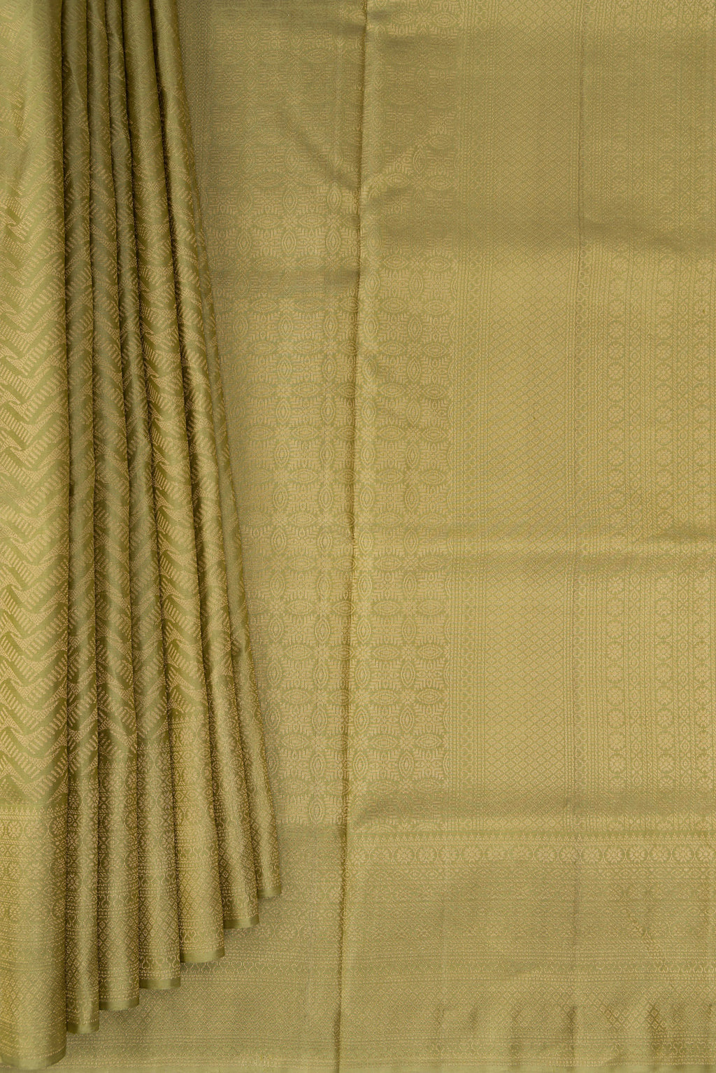 Pleats and pallu of Sage Green Soft Silk Saree with Zari Brocade on the body and Fancy Border. 