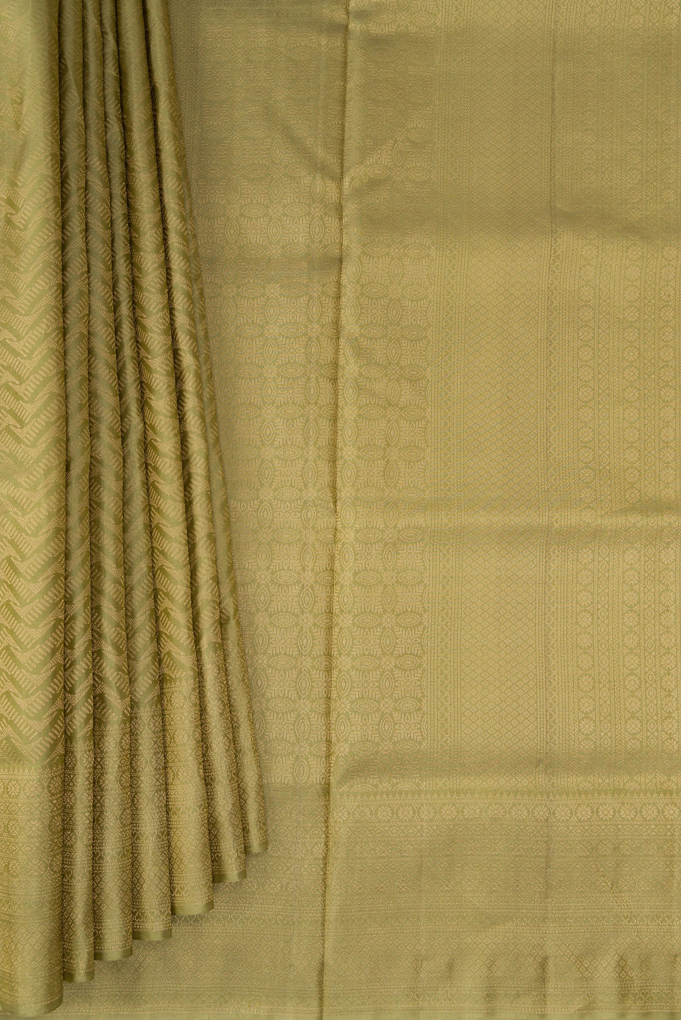 Pleats and pallu of Sage Green Soft Silk Saree with Zari Brocade on the body and Fancy Border. 