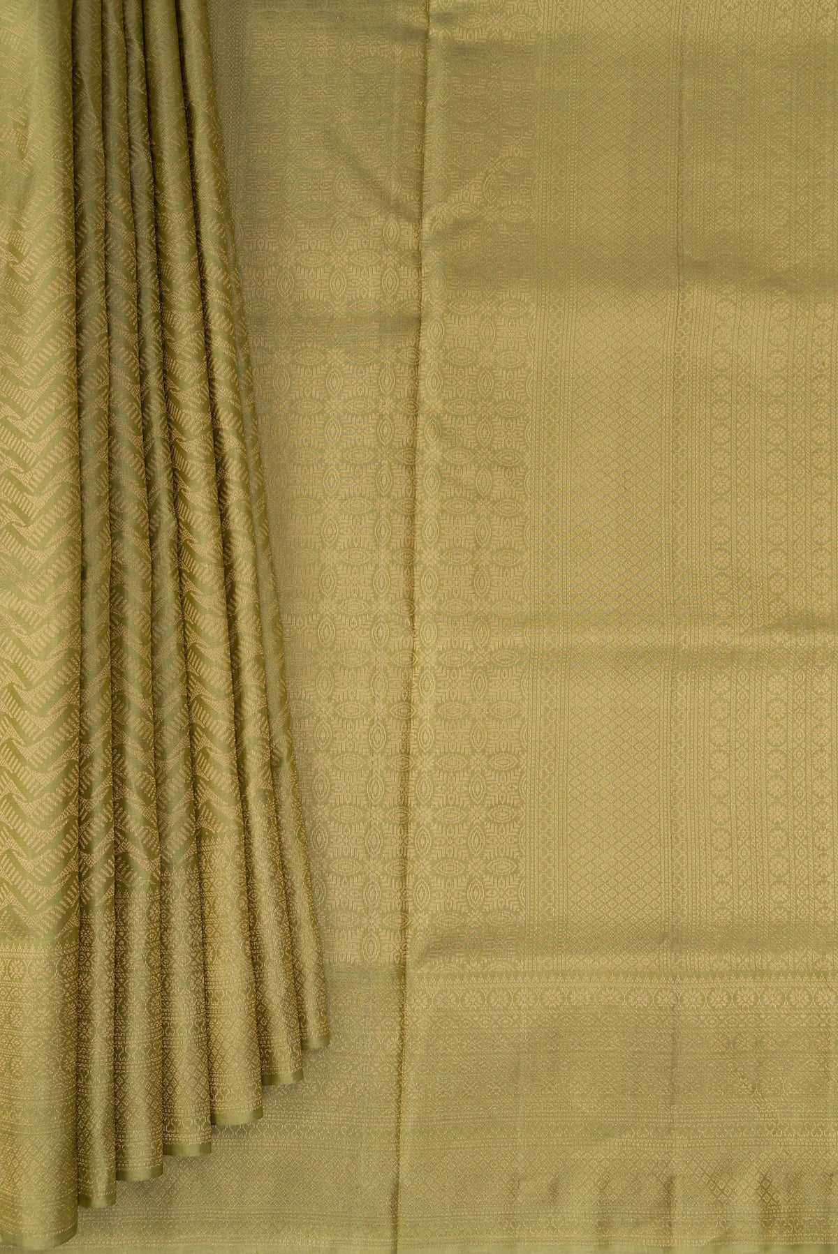 Pleats and pallu of Sage Green Soft Silk Saree with Zari Brocade on the body and Fancy Border. 