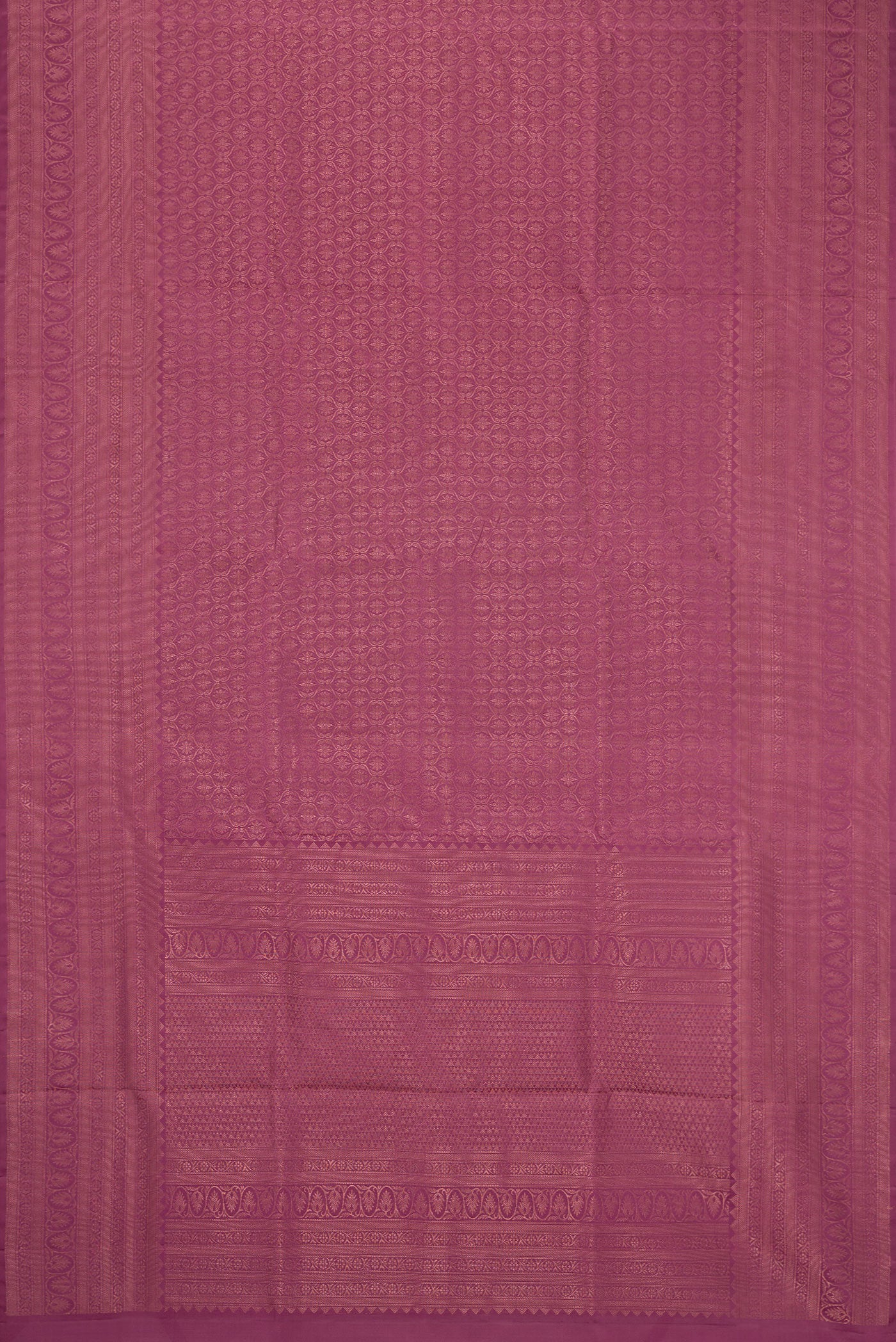 Flat view of Lavender Soft Silk Saree with Zari Brocade on the body and Fancy Border. 