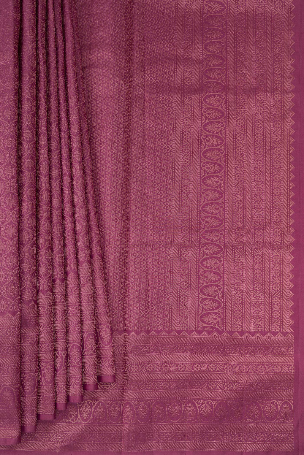 Pleats and pallu of Lavender Soft Silk Saree with Zari Brocade on the body and Fancy Border. 