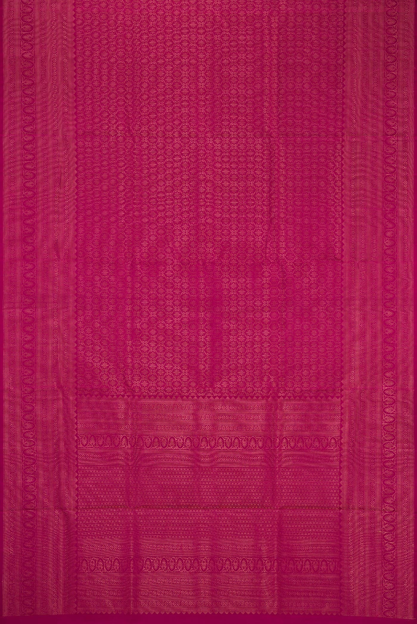 Flat view of Magenta Soft Silk Saree with Zari Brocade on the body and Fancy Border. 