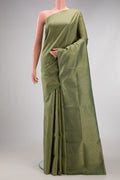 Sage Green Soft Silk Saree with Zari Brocade on the body and Fancy Border.  displayed on a mannequin
