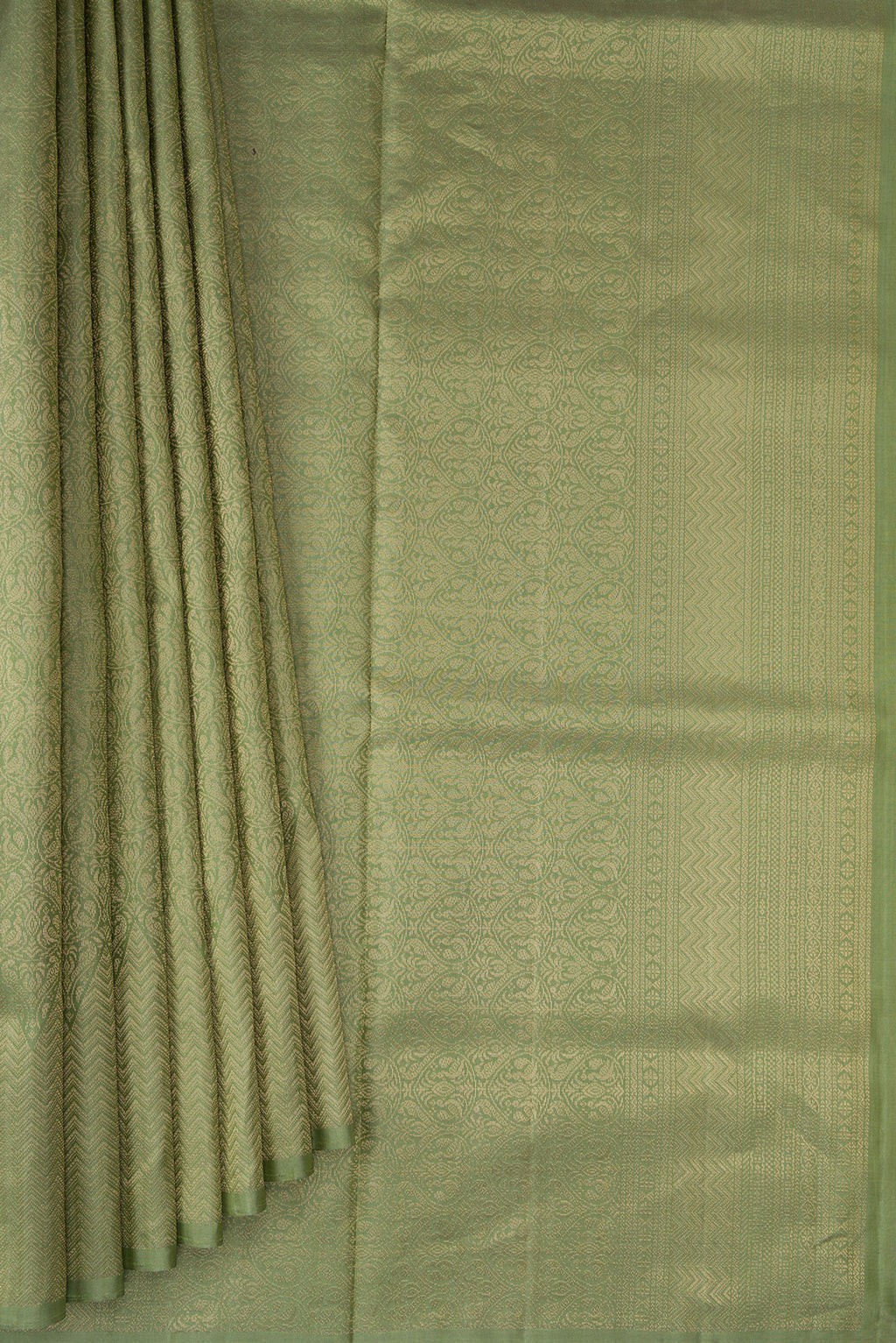 Pleats and pallu of Sage Green Soft Silk Saree with Zari Brocade on the body and Fancy Border. 