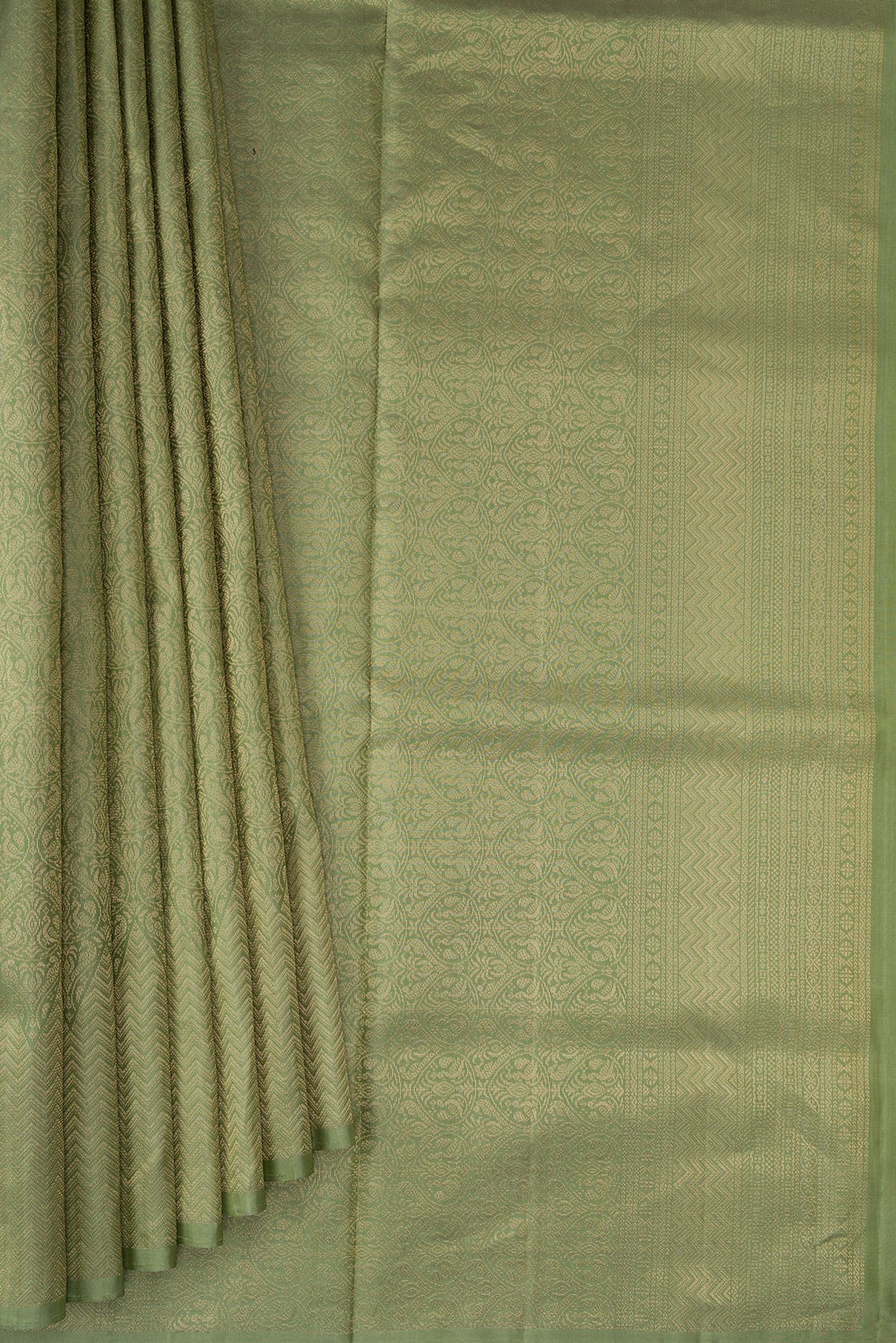 Pleats and pallu of Sage Green Soft Silk Saree with Zari Brocade on the body and Fancy Border. 
