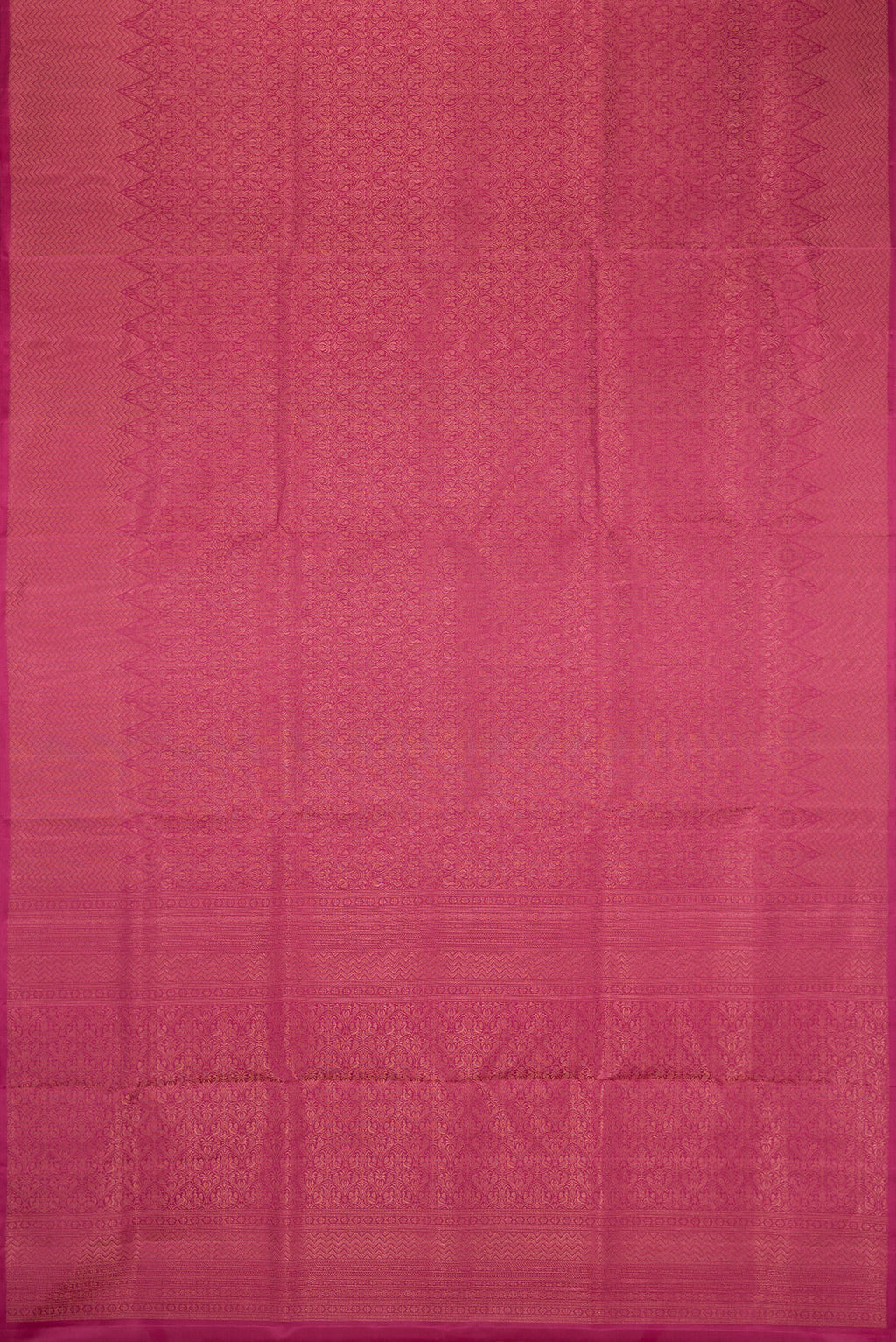 Flat view of Dark Pink Soft Silk Saree with Zari Brocade on the body and Fancy Border. 