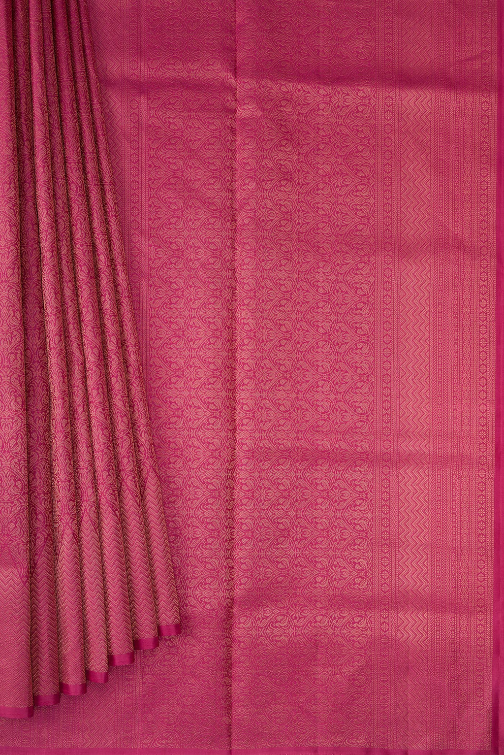 Pleats and pallu of Dark Pink Soft Silk Saree with Zari Brocade on the body and Fancy Border. 