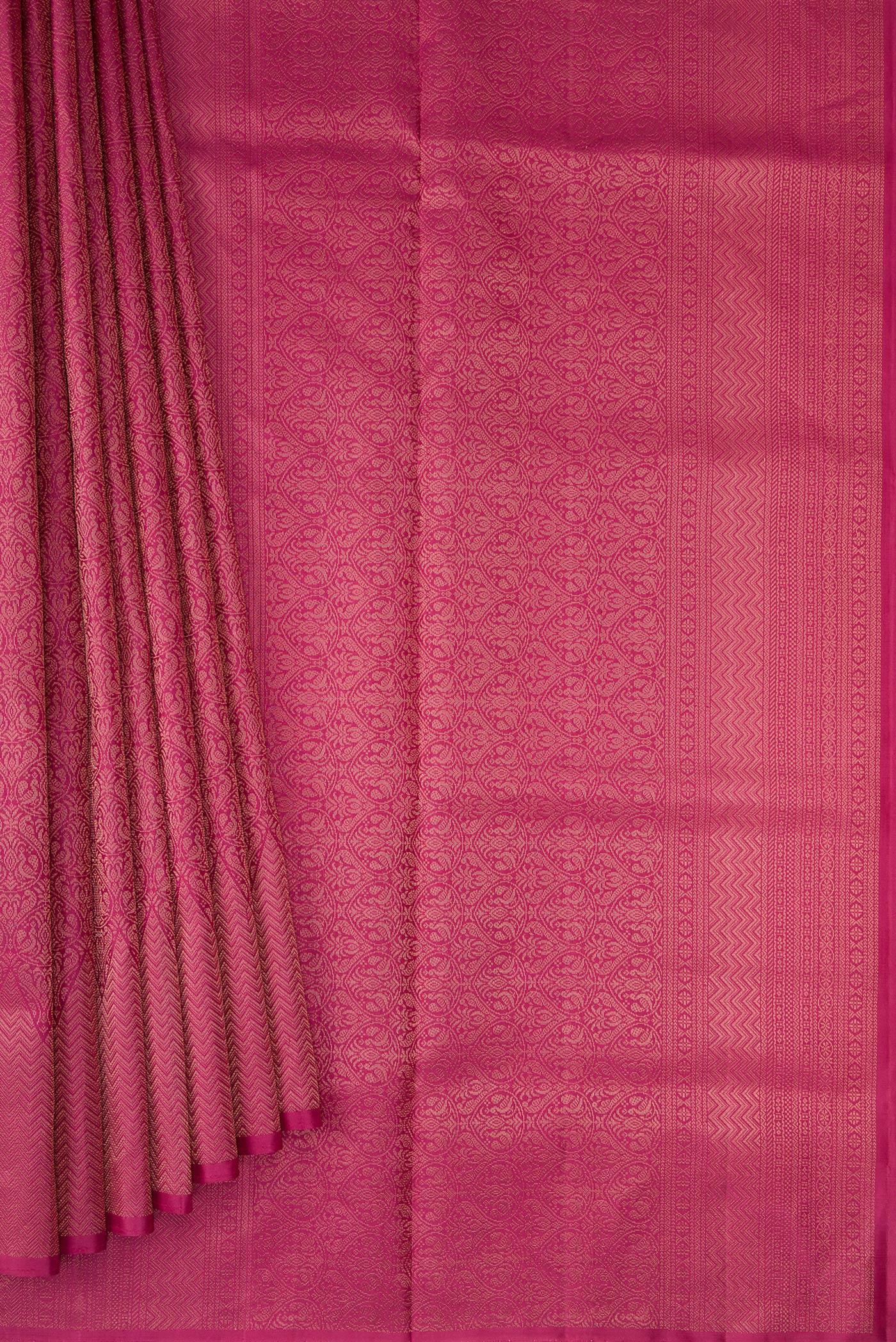 Pleats and pallu of Dark Pink Soft Silk Saree with Zari Brocade on the body and Fancy Border. 