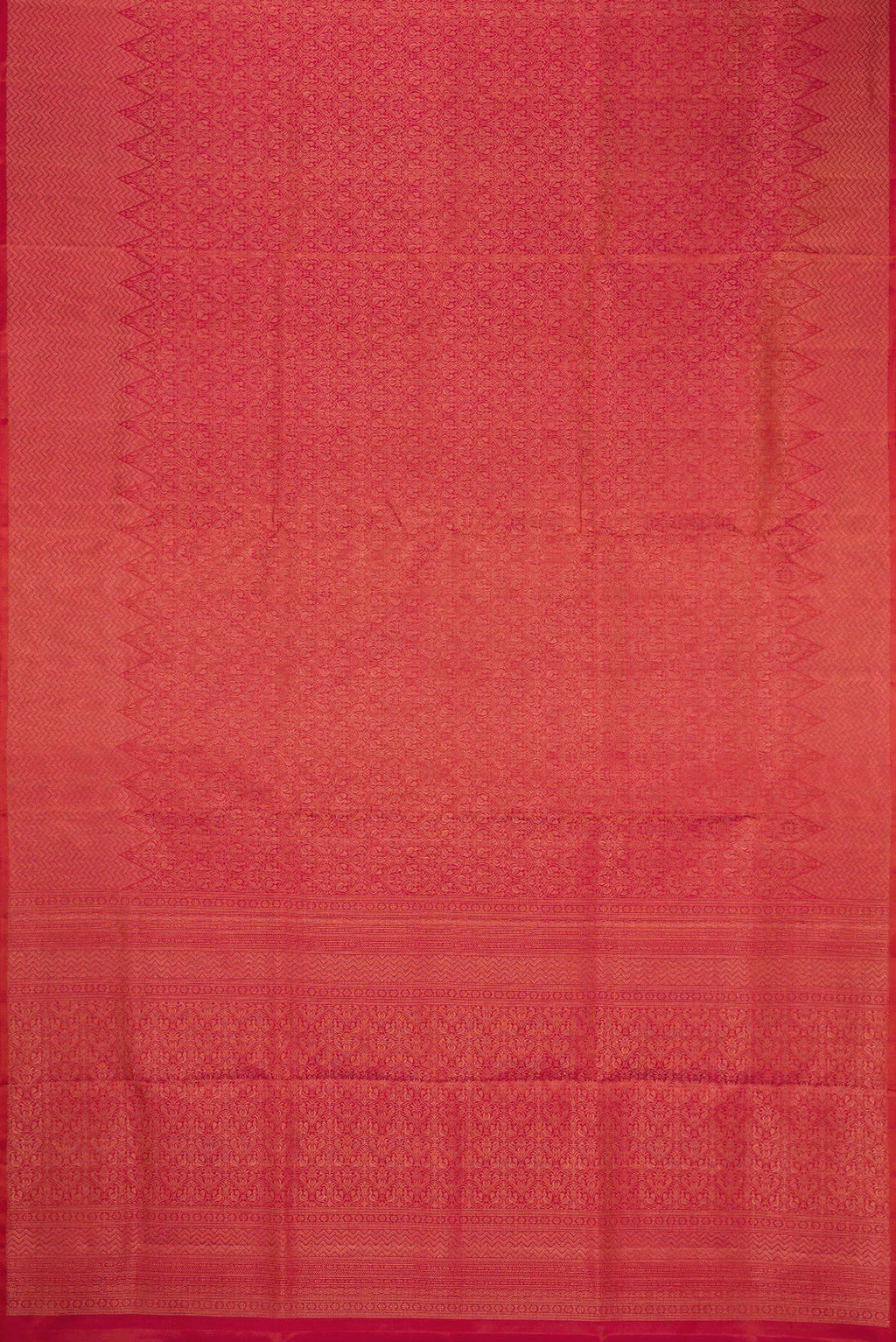 Flat view of Coral Soft Silk Saree with Zari Brocade on the body and Fancy Border. 