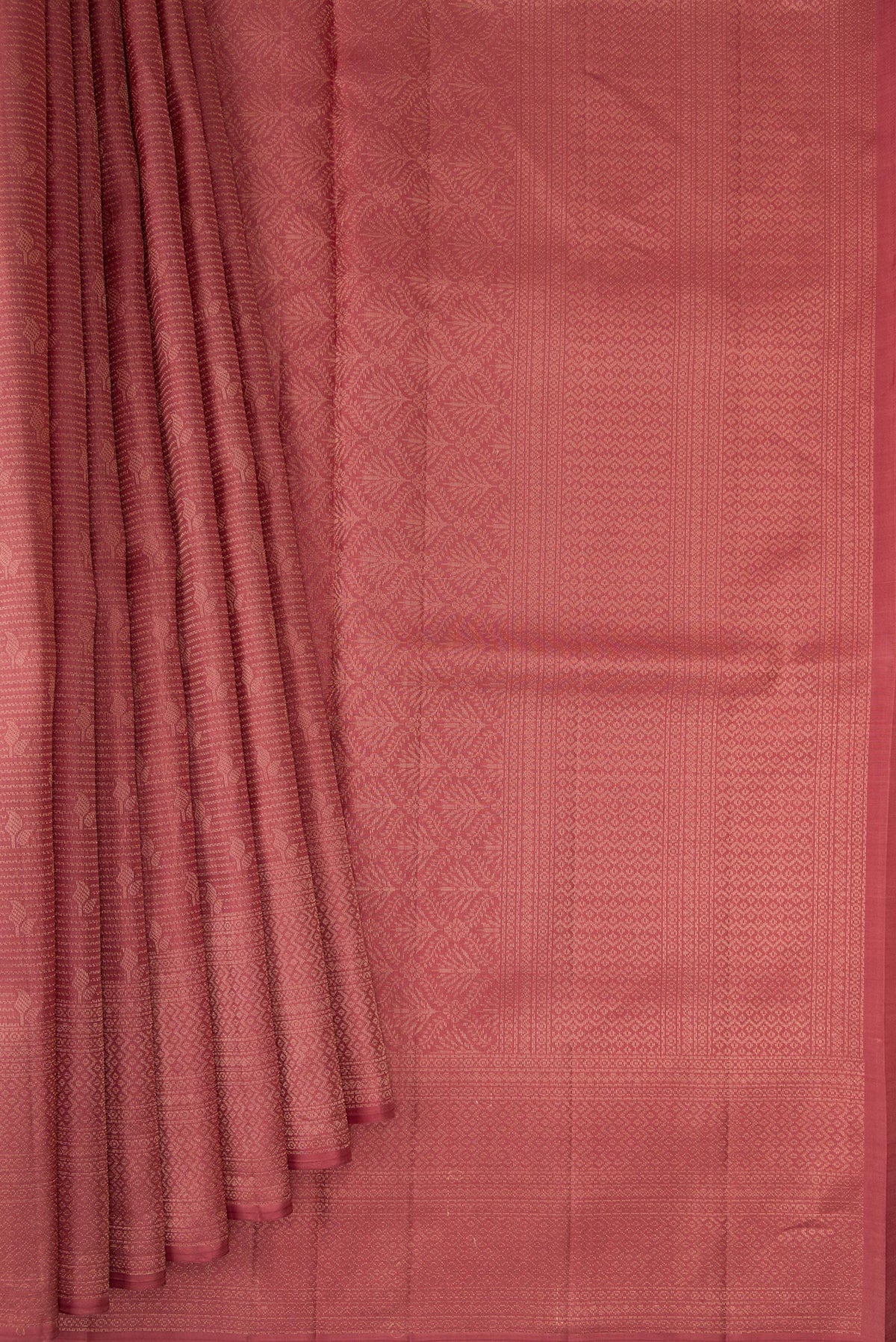 Pleats and pallu of Rose Gold Soft Silk Saree with Zari Brocade on the body and Fancy Border. 