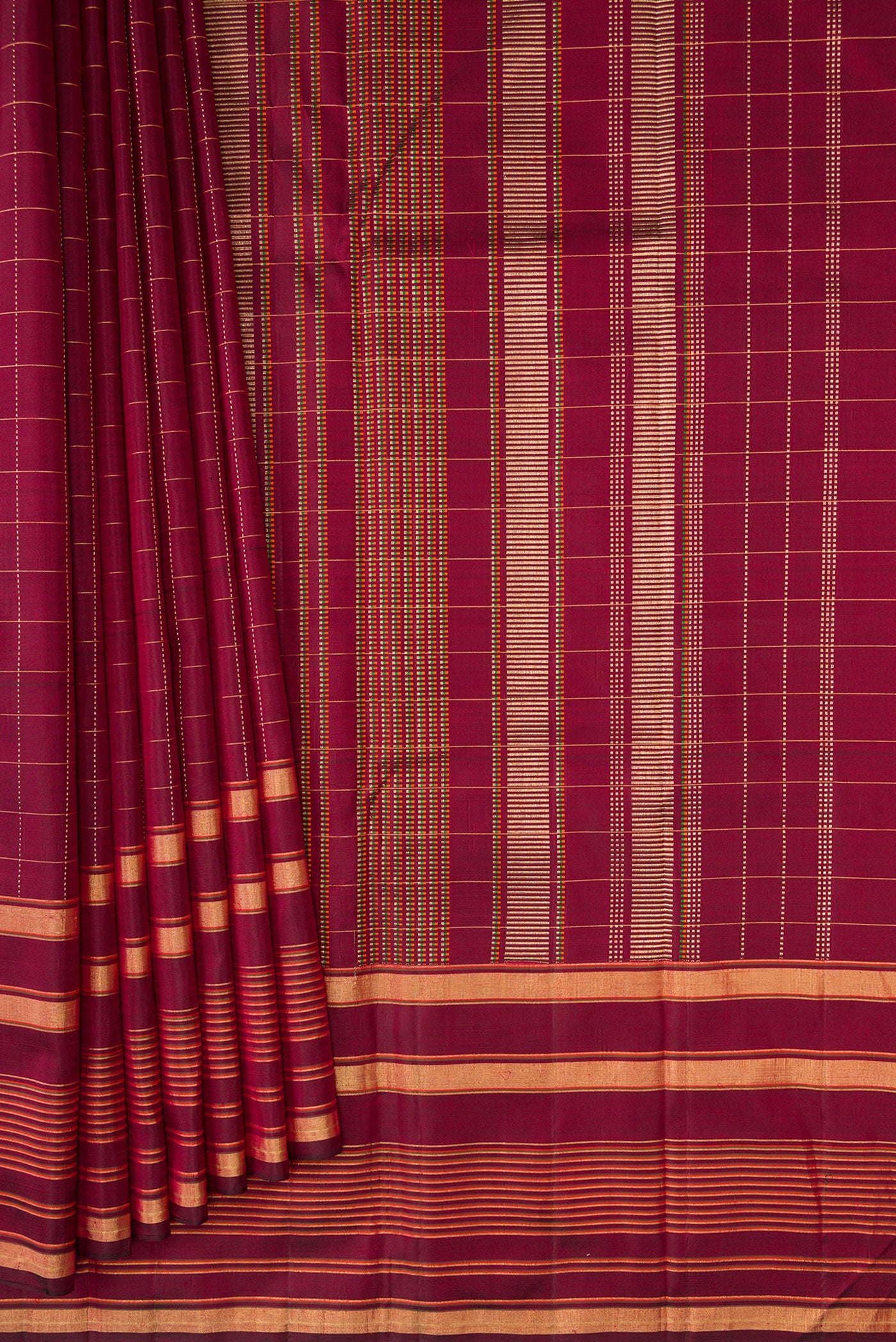 Pleats and pallu of Maroon Kanjivaram Silk Saree with Checked design on the body and Zari Border. 