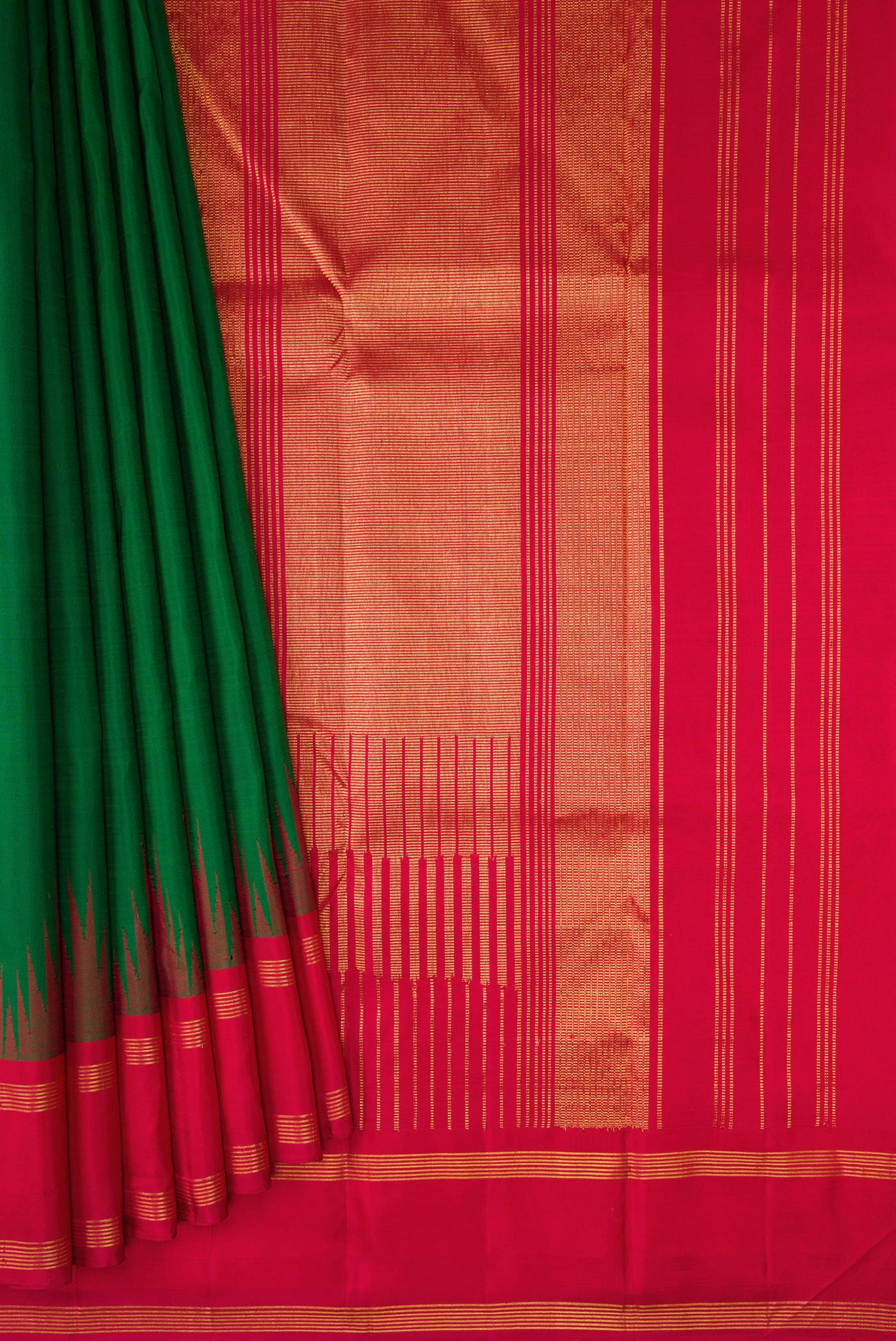 Pleats and pallu of Bottle Green Kanjivaram Silk Saree with Plain Body and Temple Border. 