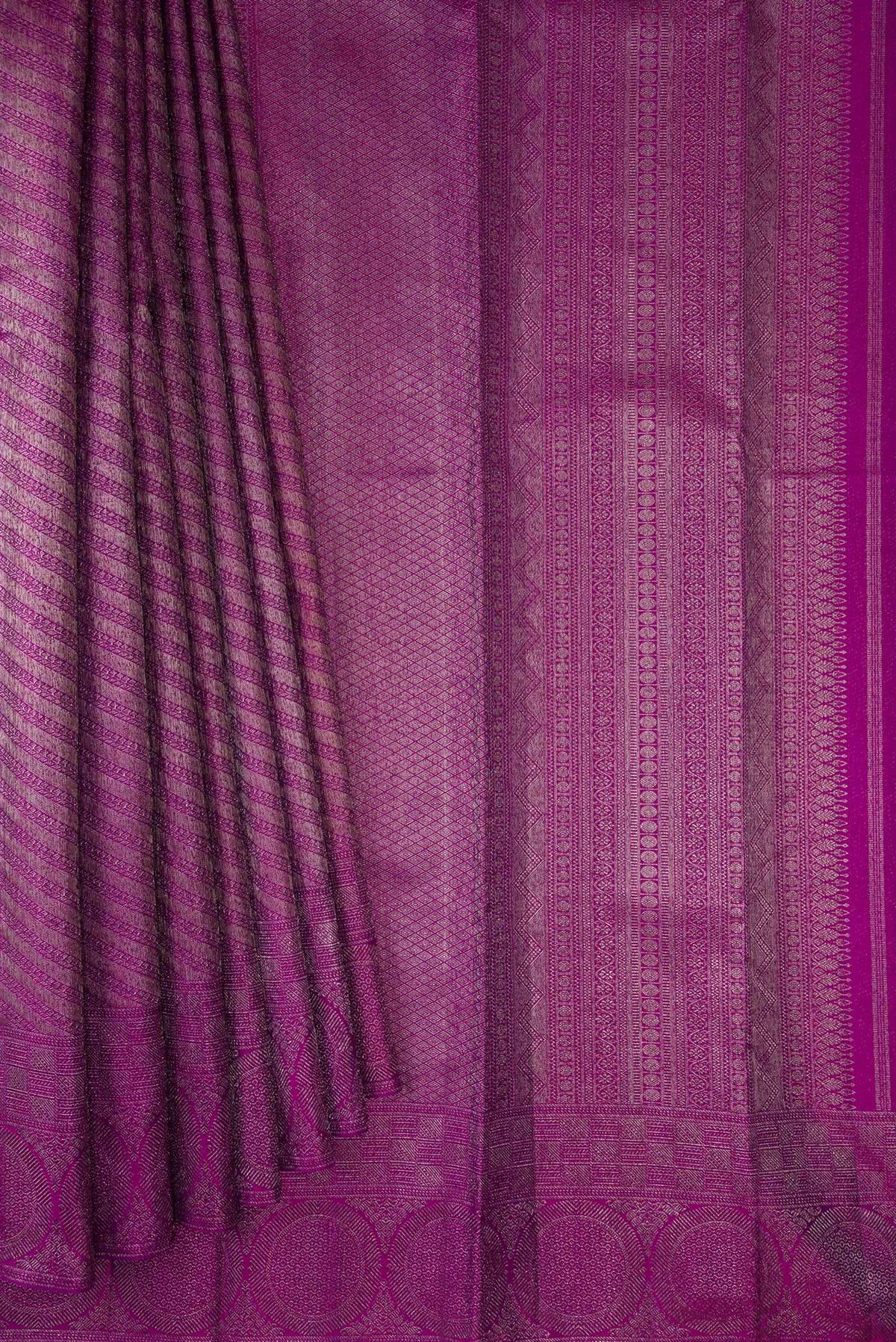 Pleats and pallu of Pure Silk Magenta Kanjivaram Saree with Zari Brocade on the body and Zari Border. 