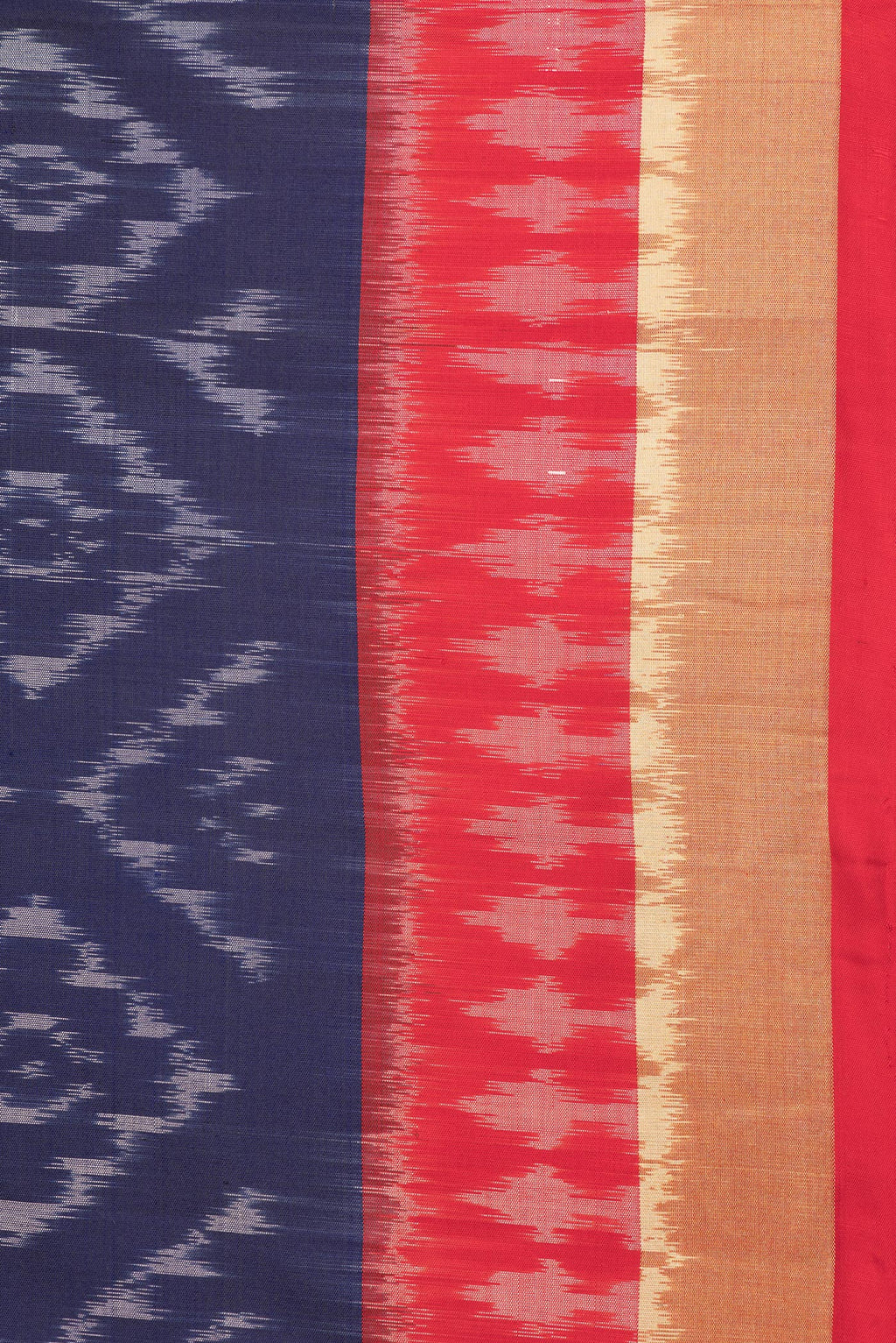 Border image of Pure Silk Navy Blue Dual Tone Soft Saree with Ikat Print on the body and Ikat Border. 