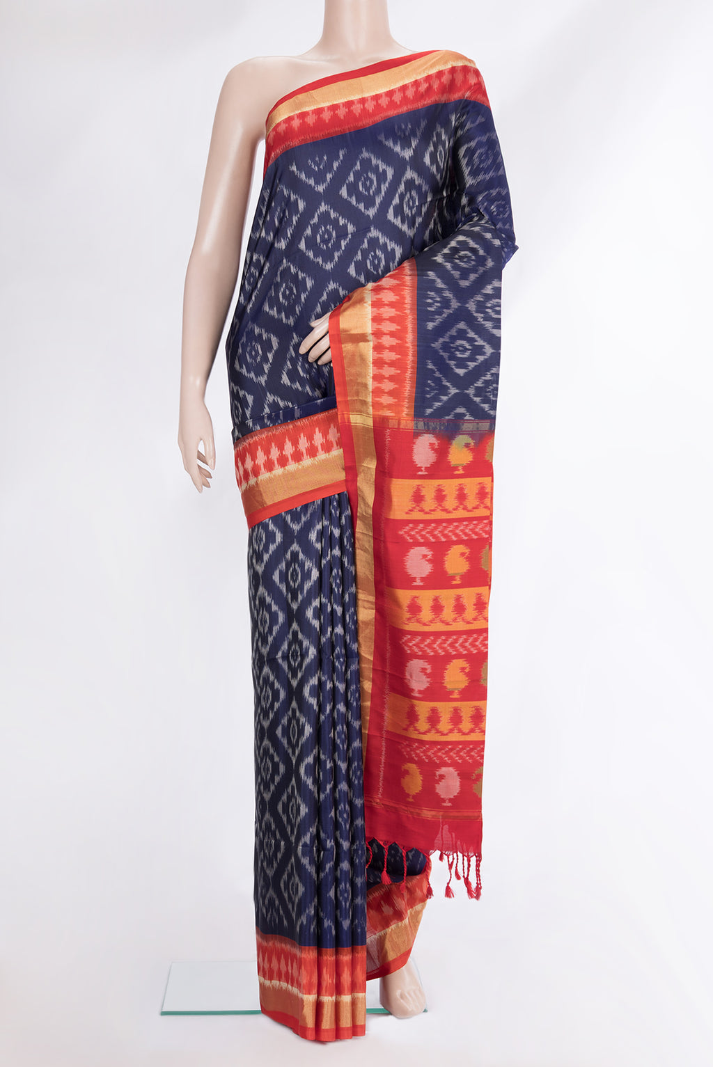 Pure Silk Navy Blue Dual Tone Soft Saree with Ikat Print on the body and Ikat Border.  displayed on a mannequin