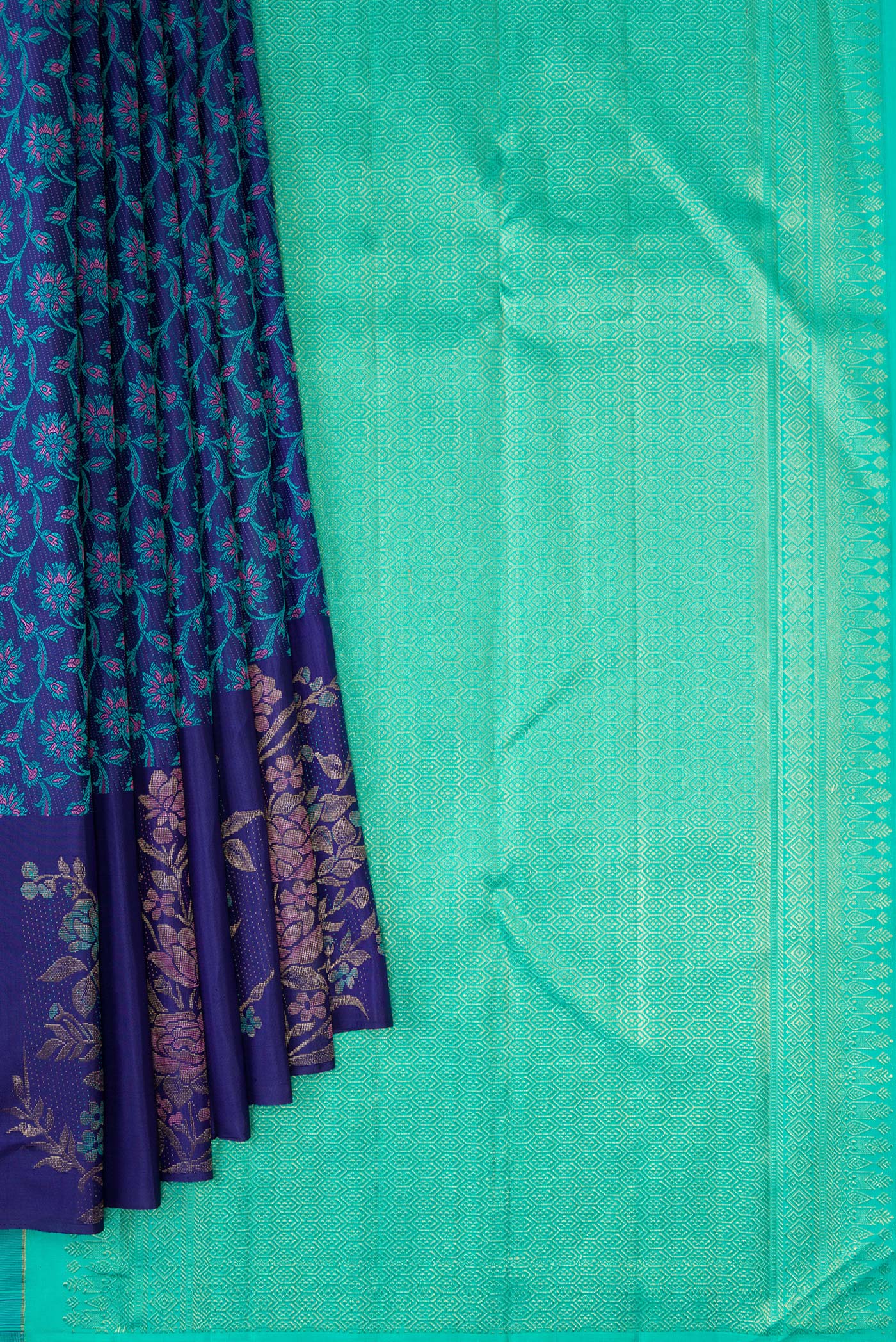 Pleats and pallu of Navy Blue Kanchipuram Silk Saree with Jacquard design on the body and Fancy Border. 