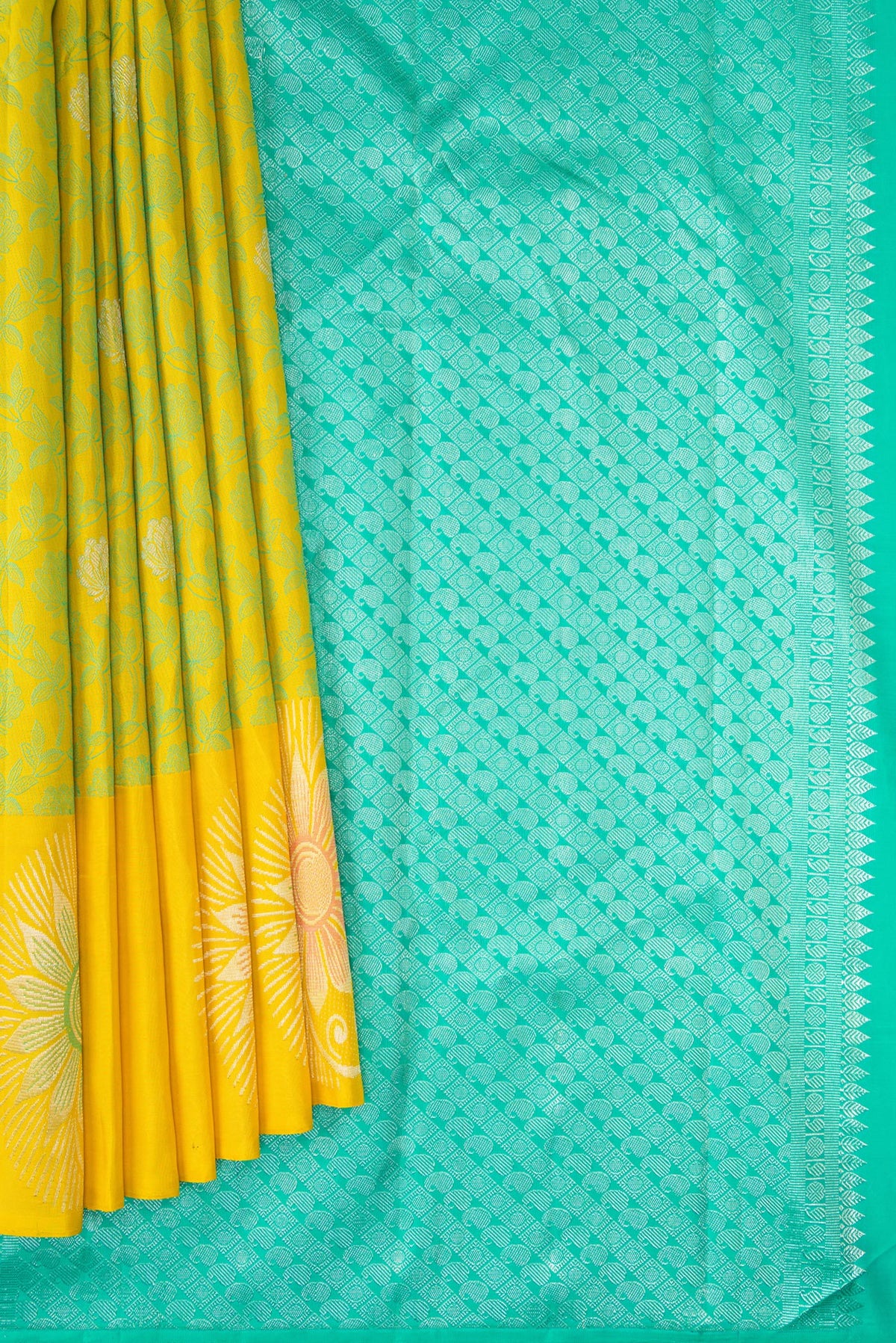 Pleats and pallu of Lemon Yellow Kanjivaram Silk Saree with Jacquard design on the body and Fancy Border. 