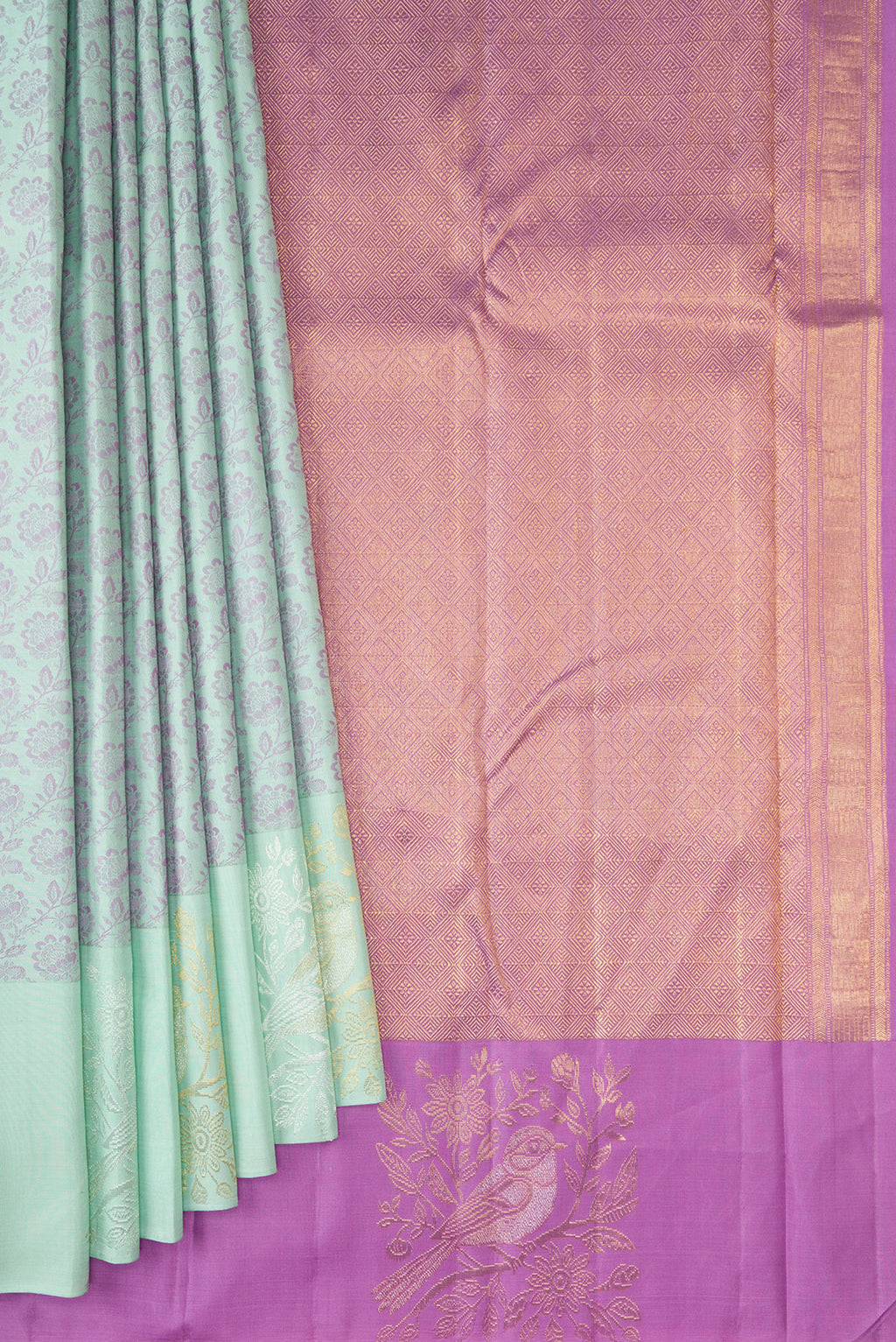 Pleats and pallu of Light Blue Kanjivaram Silk Saree with Jacquard design on the body and Fancy Border. 