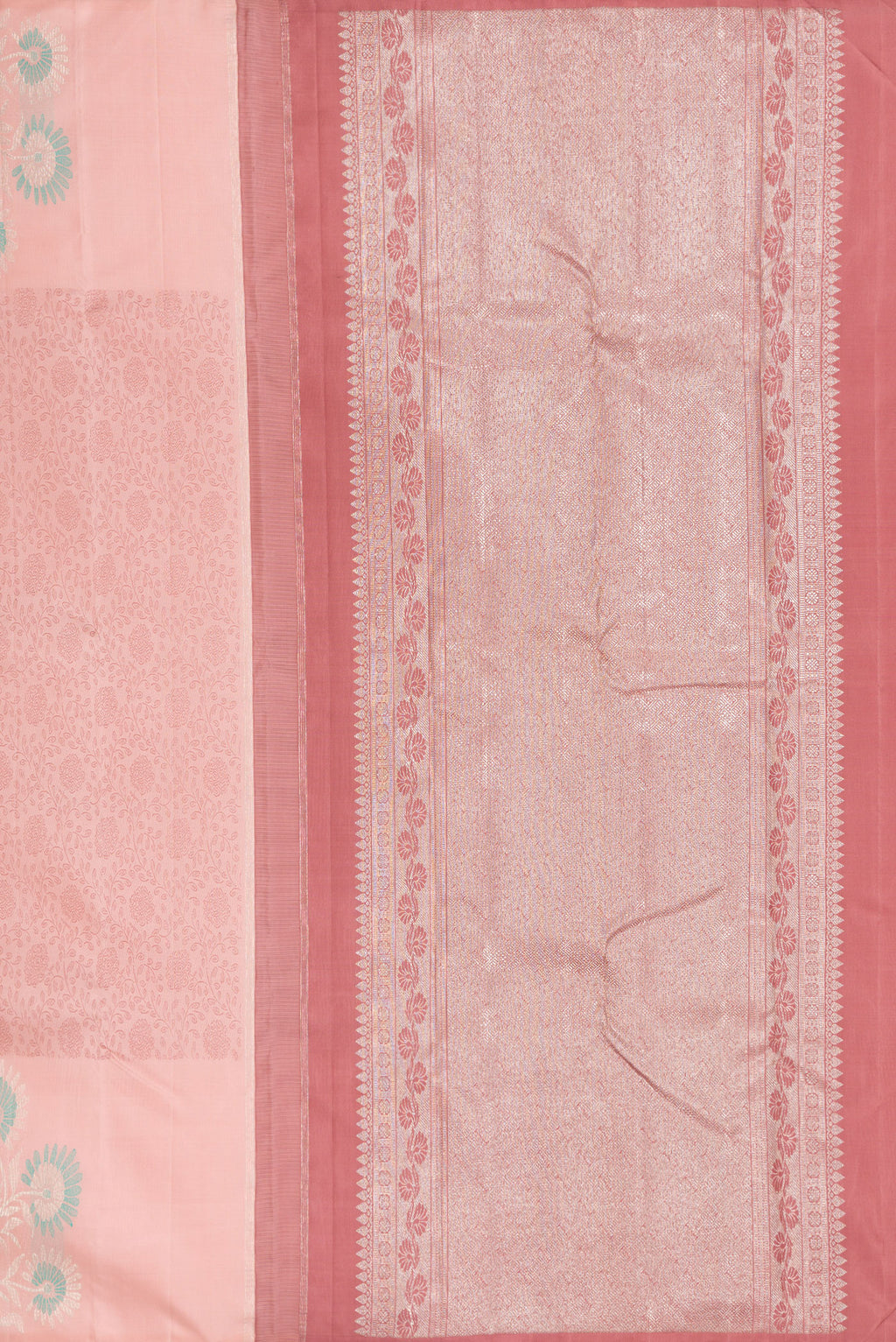 Close up image of the pallu of Peach Kanjivaram Silk Saree with Jacquard design on the body and Fancy Border. 