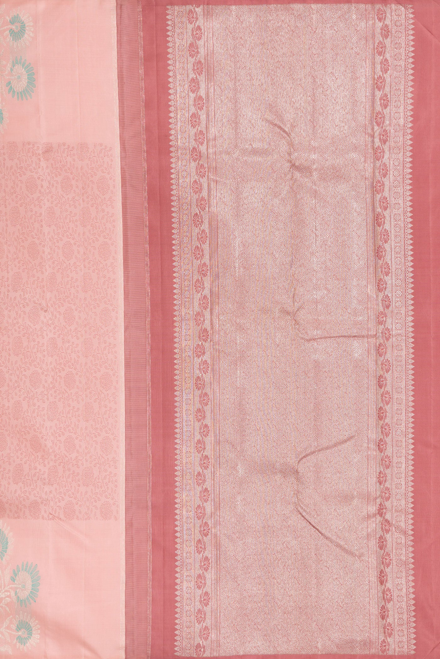 Close up image of the pallu of Peach Kanjivaram Silk Saree with Jacquard design on the body and Fancy Border. 