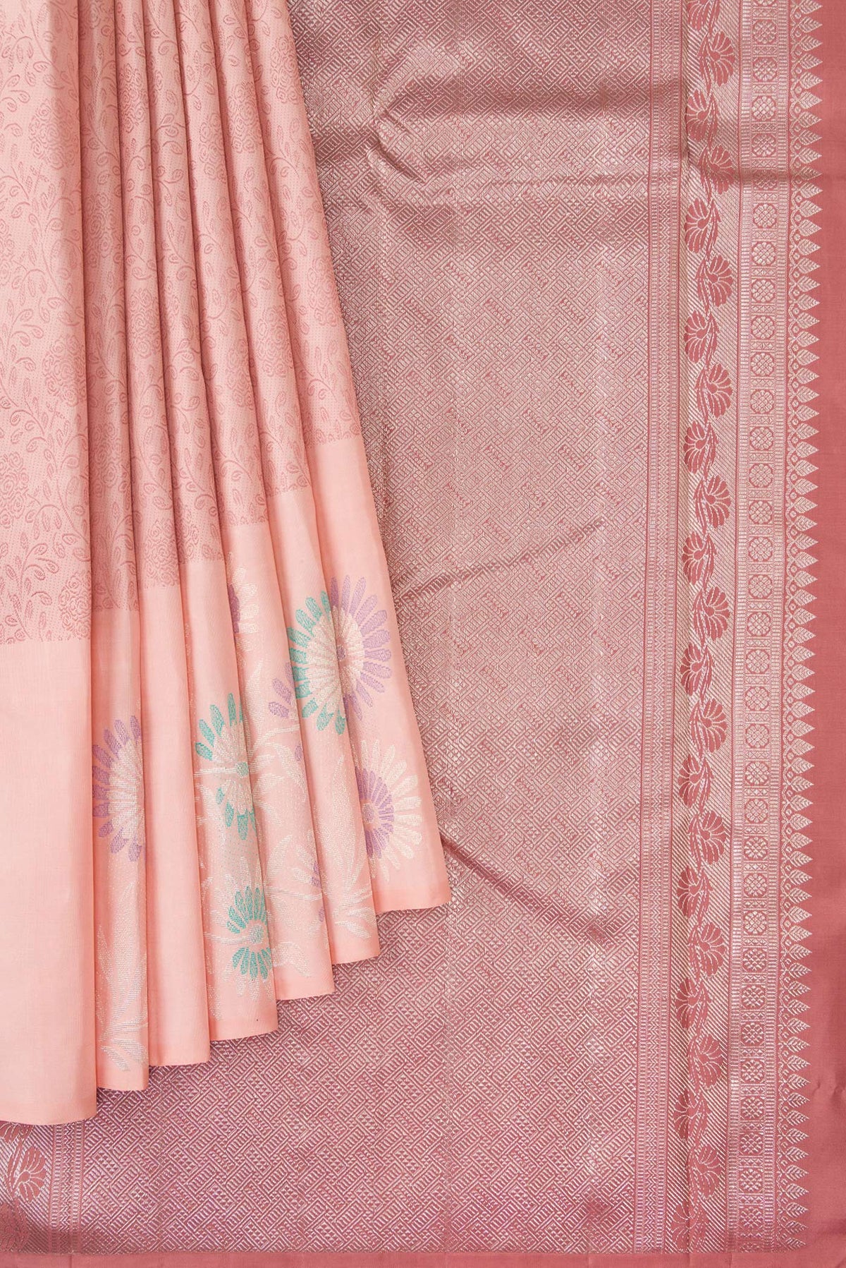 Pleats and pallu of Peach Kanjivaram Silk Saree with Jacquard design on the body and Fancy Border. 
