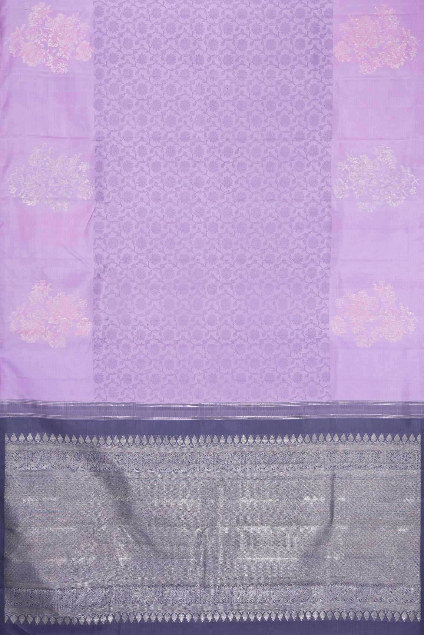 Flat view of Lavender Kanjivaram Silk Saree with Jacquard design on the body and Fancy Border. 