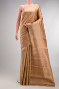 Peach Kanjivaram Silk Saree with Zari Brocade on the body and Zari Border.  displayed on a mannequin