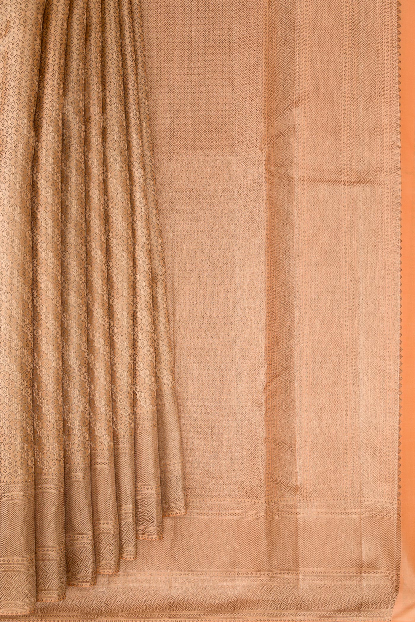 Pleats and pallu of Peach Kanjivaram Silk Saree with Zari Brocade on the body and Zari Border. 